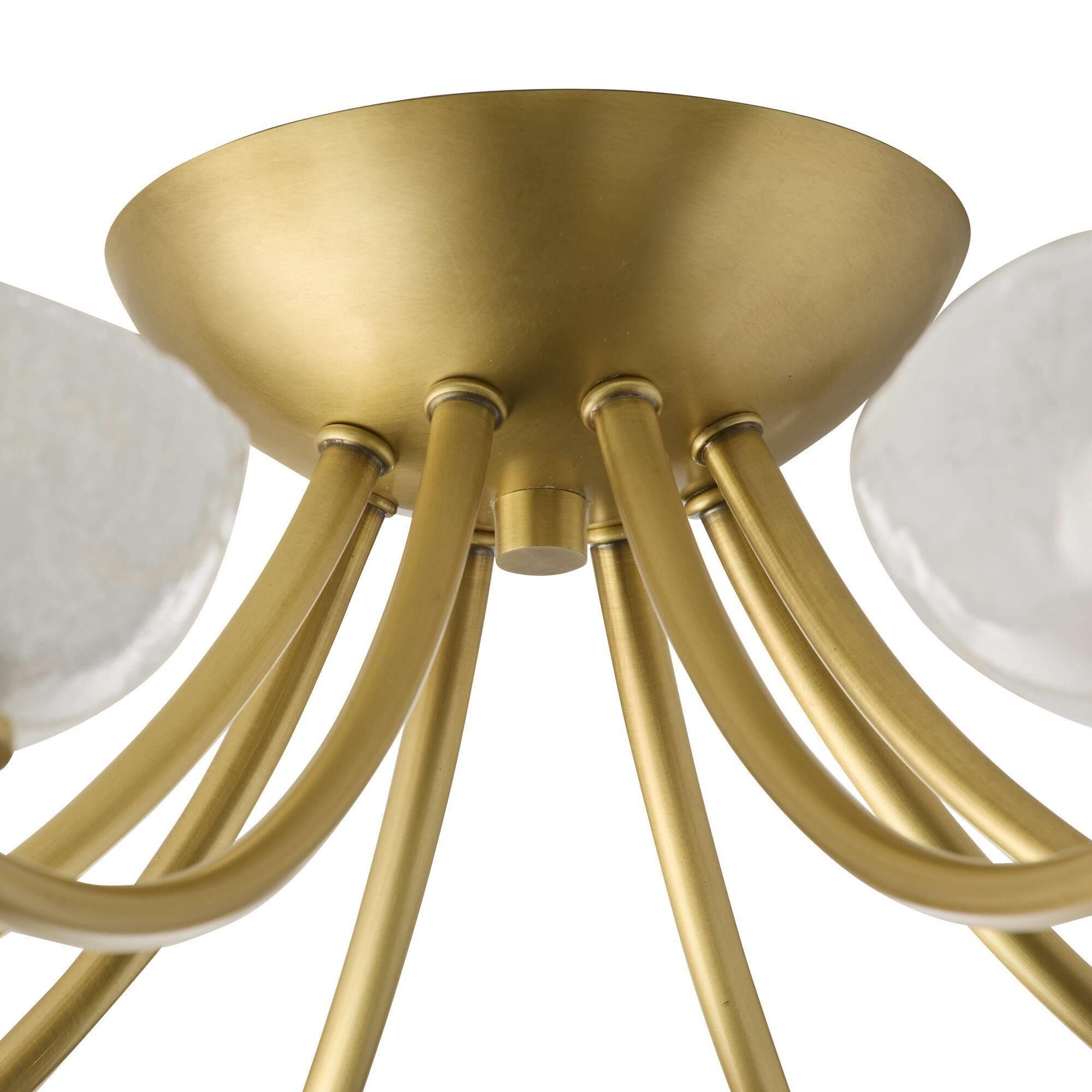 Shown in Antique Brass finish and Opal glass