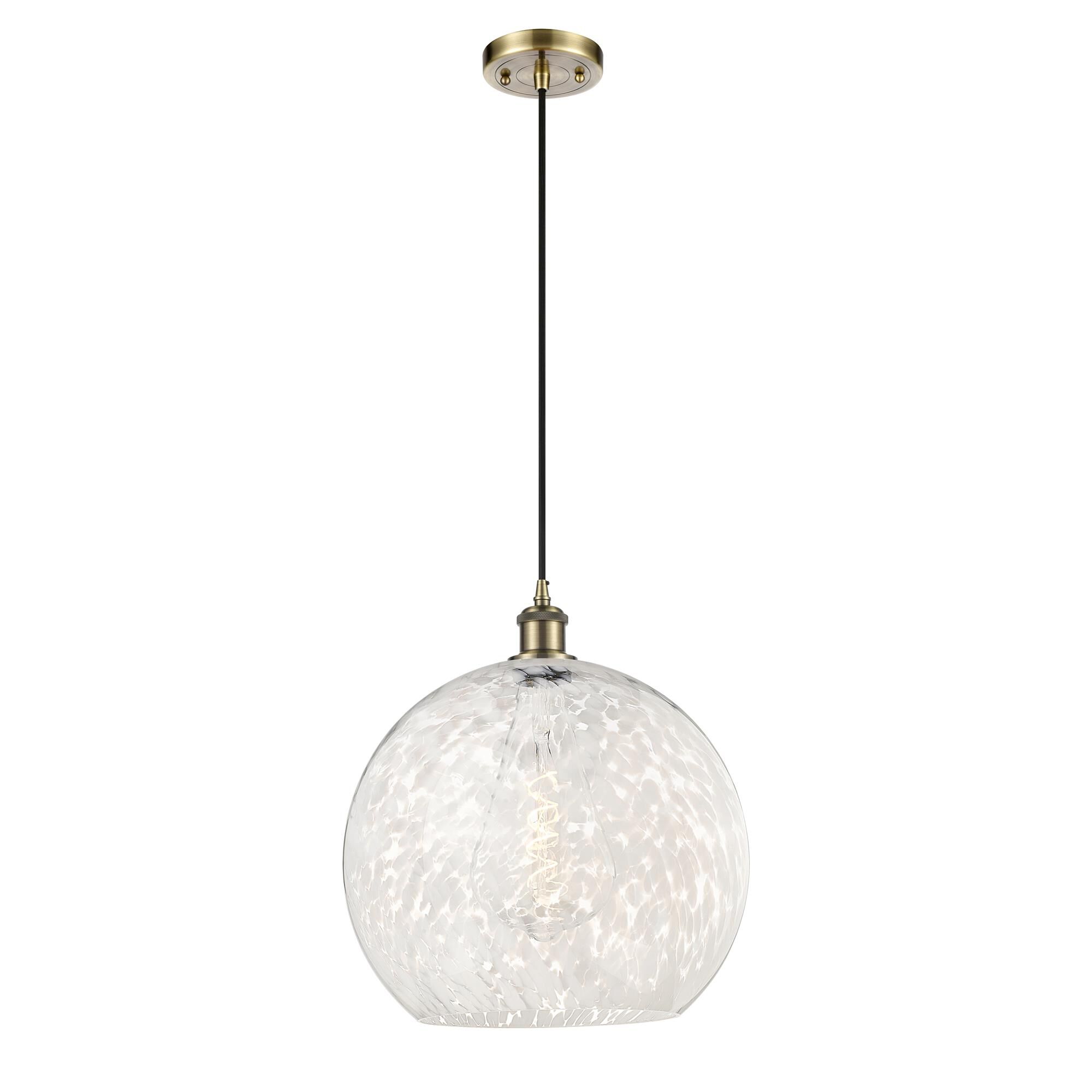 Shown in Antique Brass finish and White Mouchette glass