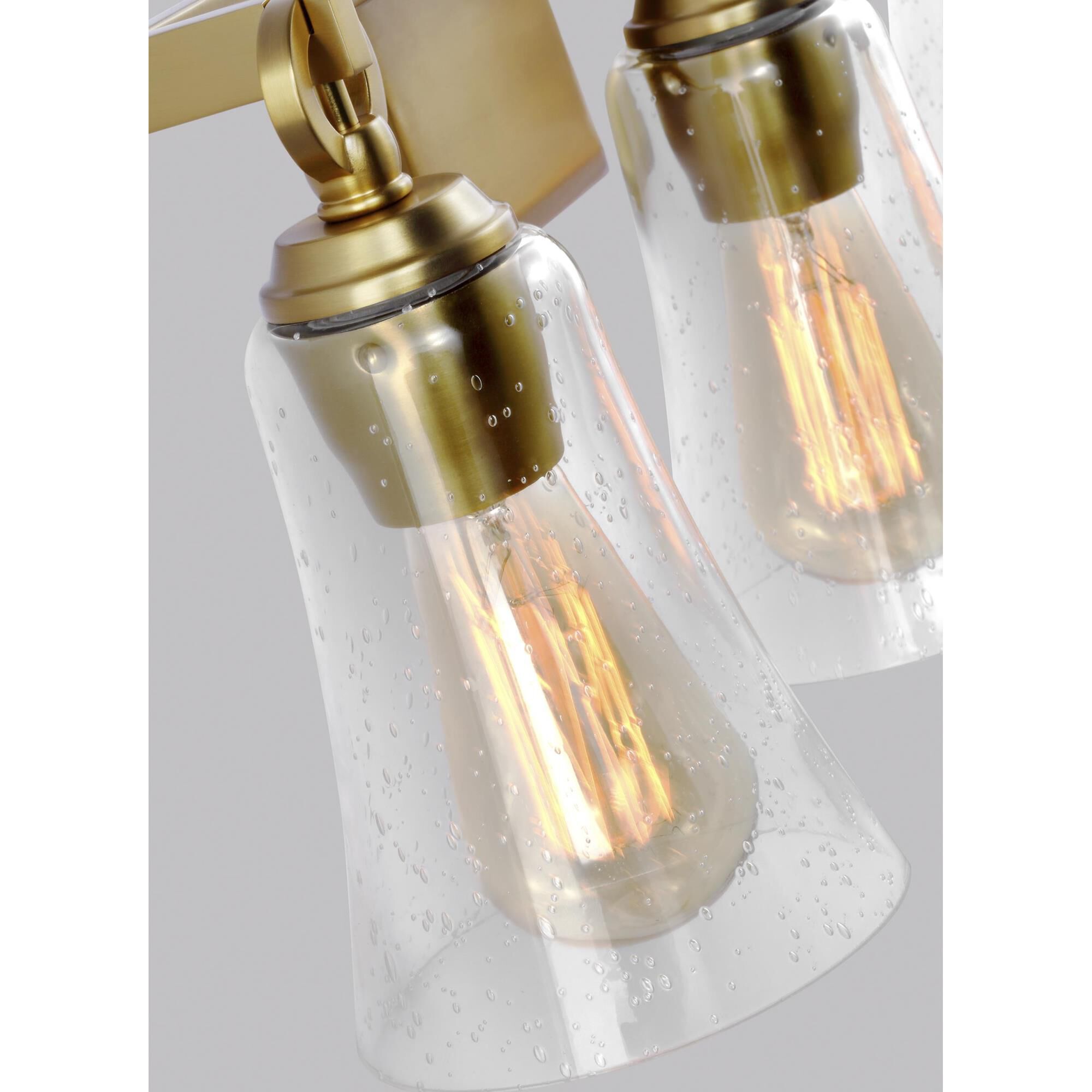 Shown in Burnished Brass finish and Clear Seeded glass