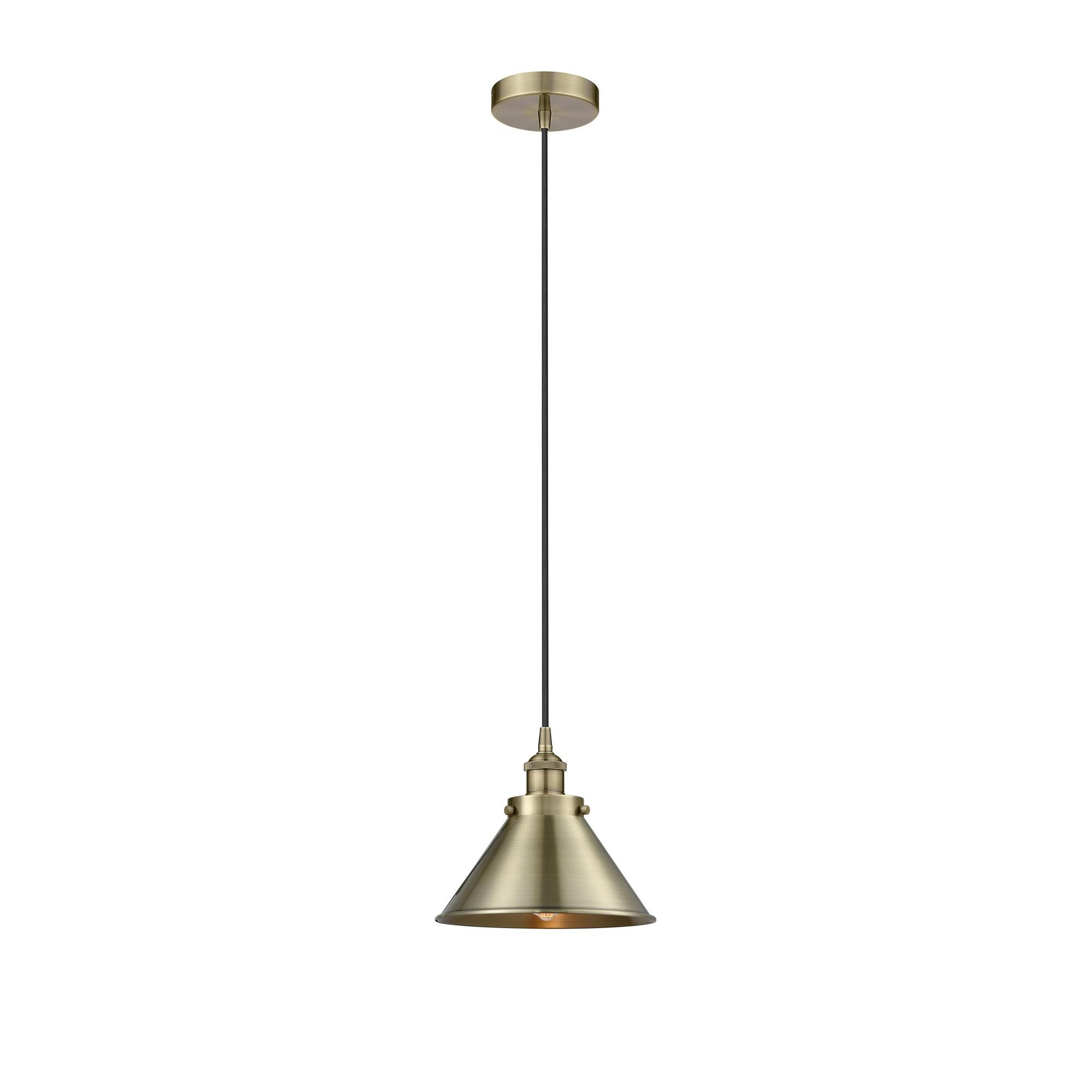 Shown in Antique Brass finish and Antique Brass shade