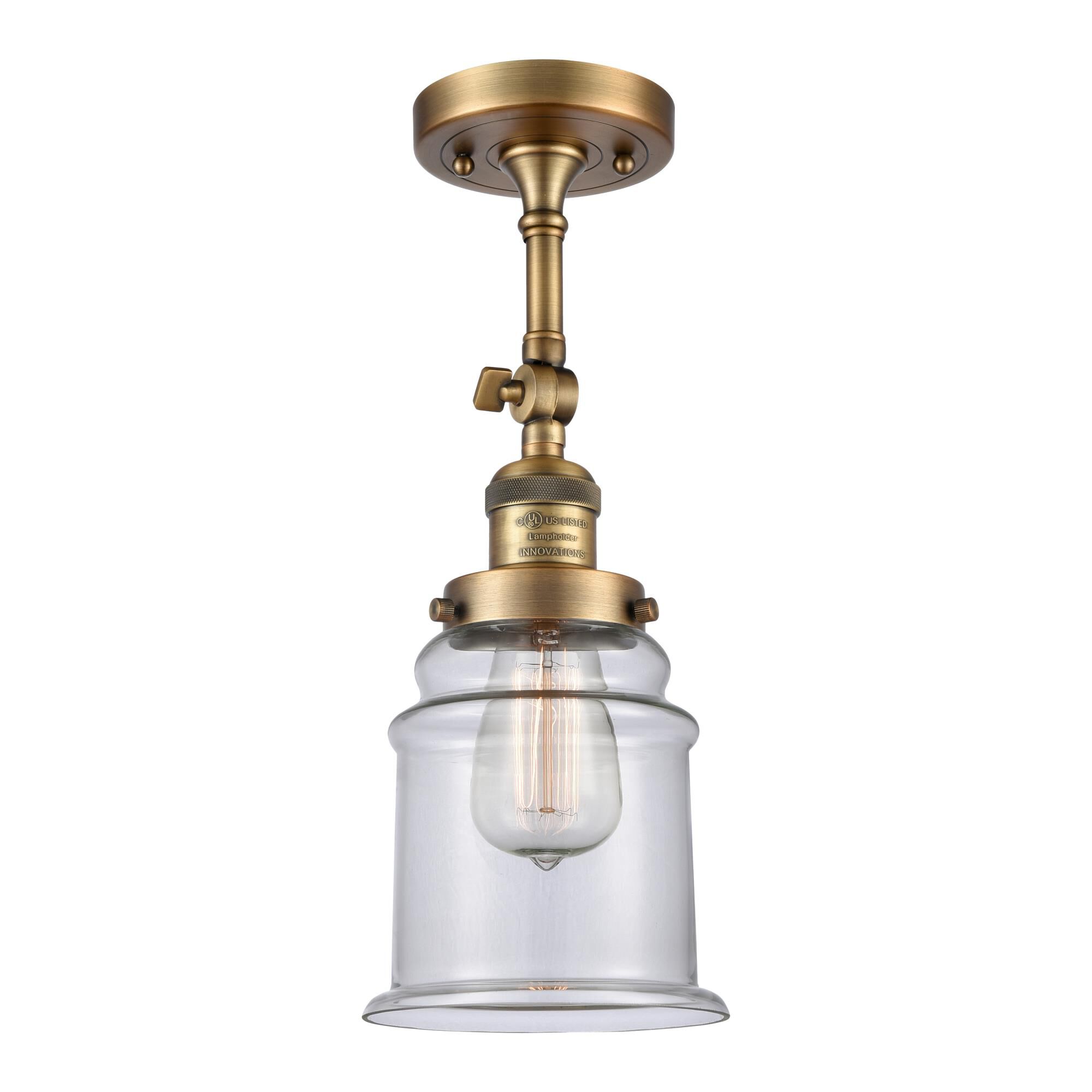 Shown in Brushed Brass finish and Clear glass and None accent