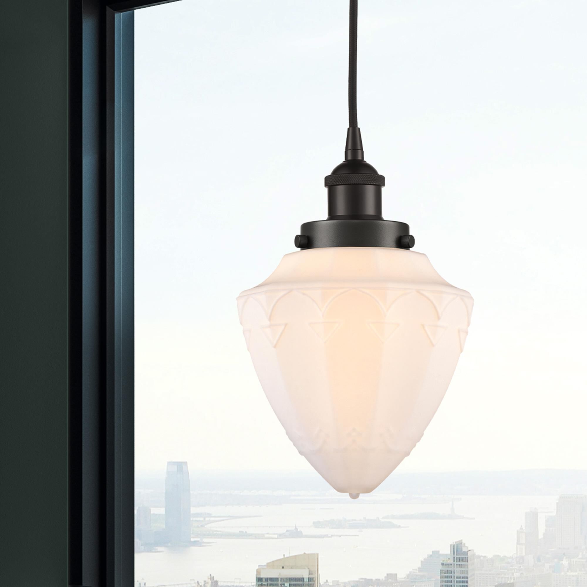 Shown in Oil Rubbed Bronze finish and Matte White Cased Small Bullet glass