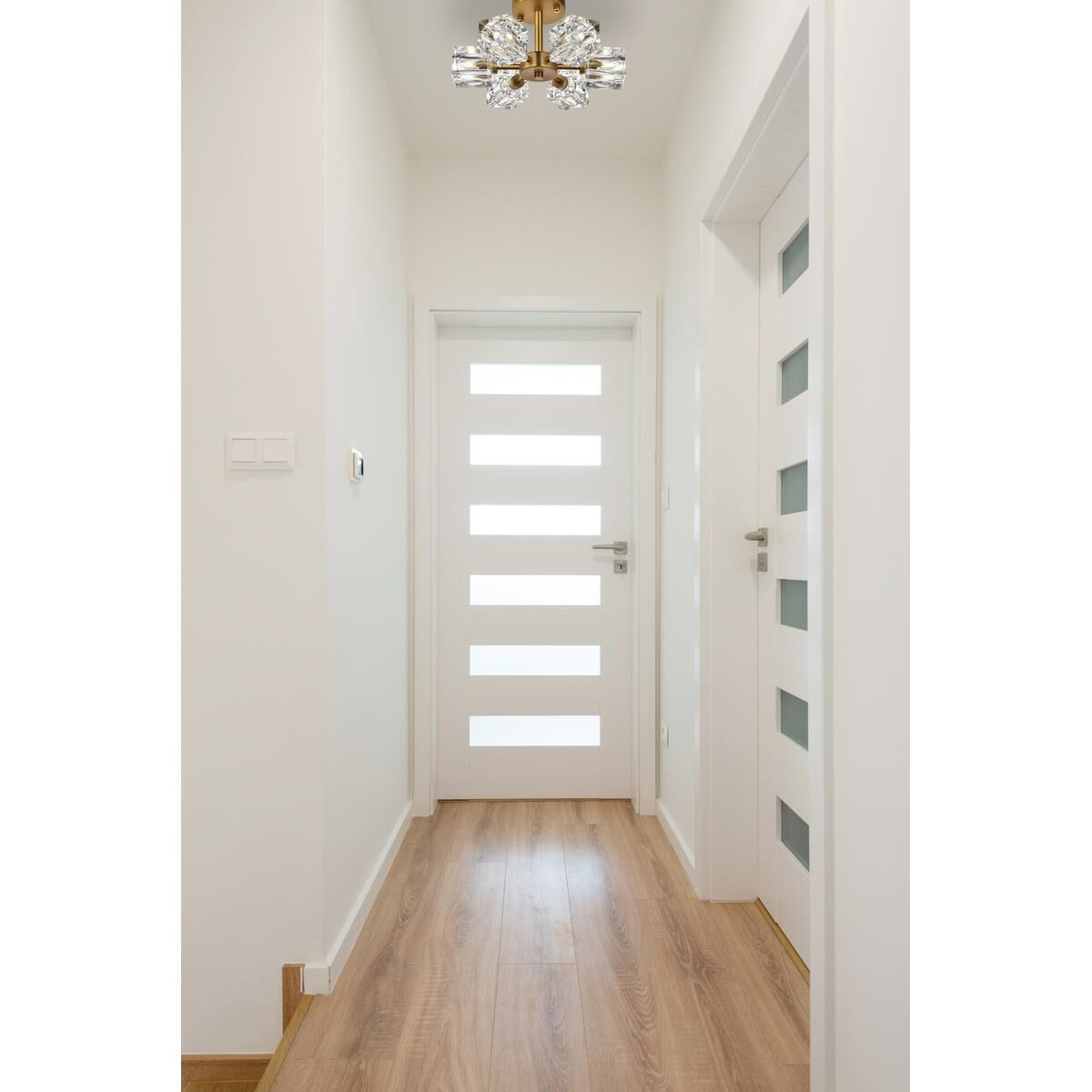 Shown in Satin Gold finish and Clear Royal Cut crystal