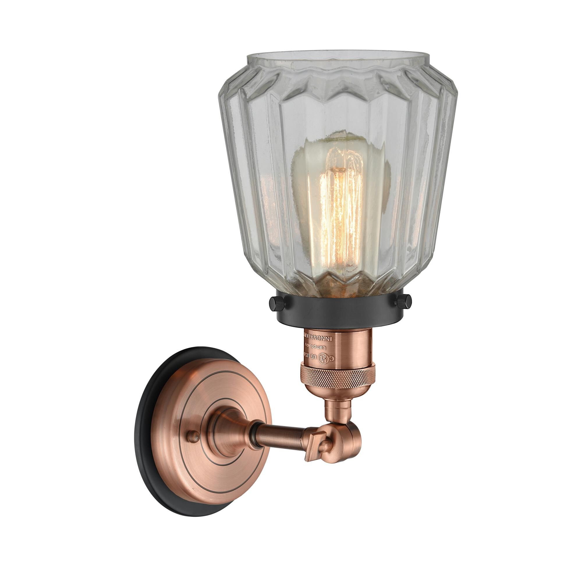 Shown in Antique Copper finish and Clear Chatham glass and Matte Black accent