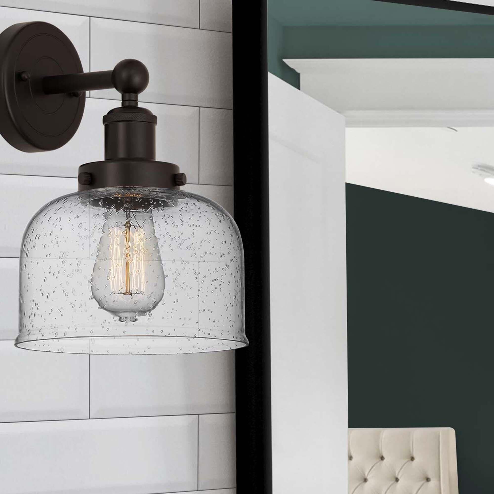 Shown in Oil Rubbed Bronze  finish and Clear Seedy glass