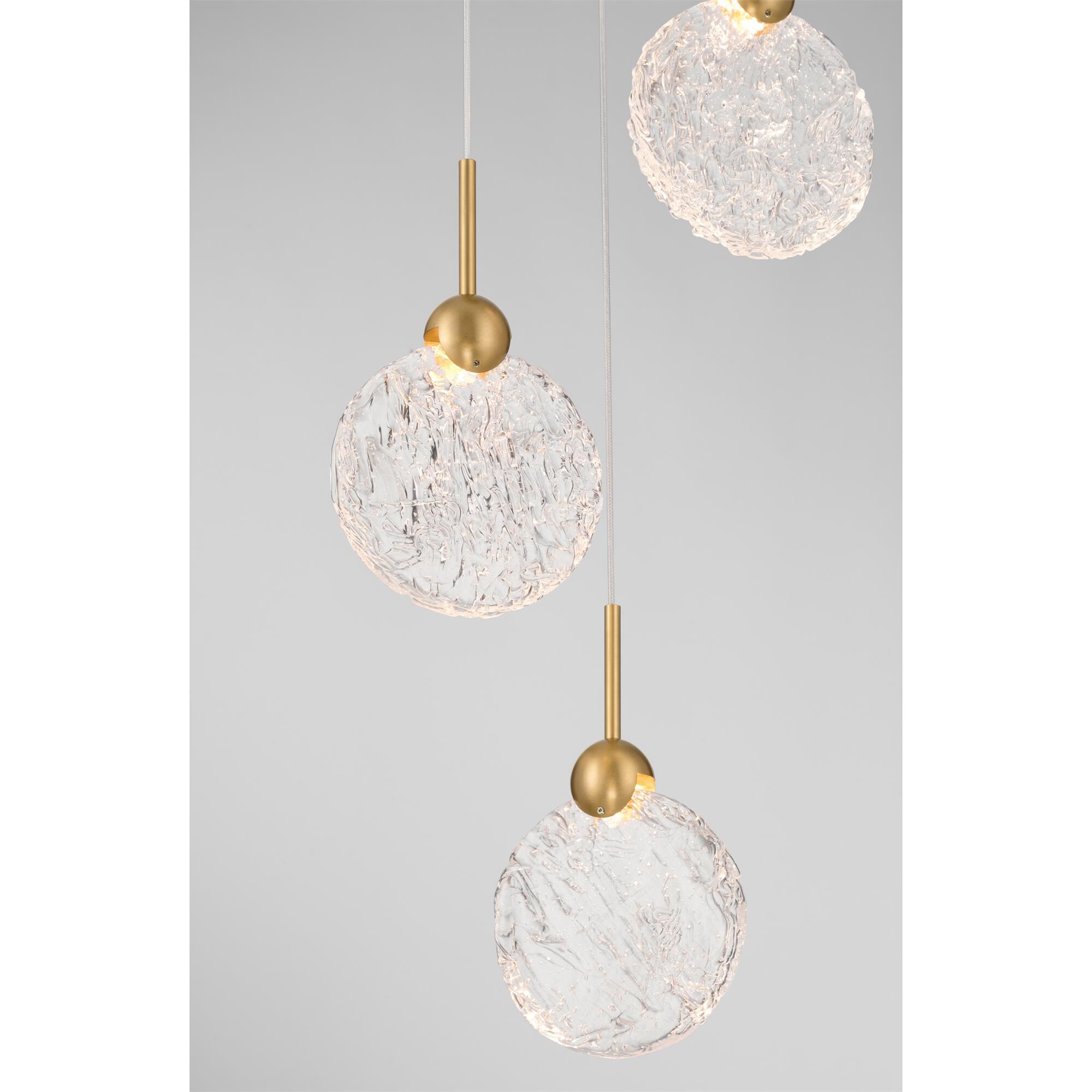 Shown in Legacy Brass finish and Clear Textured glass