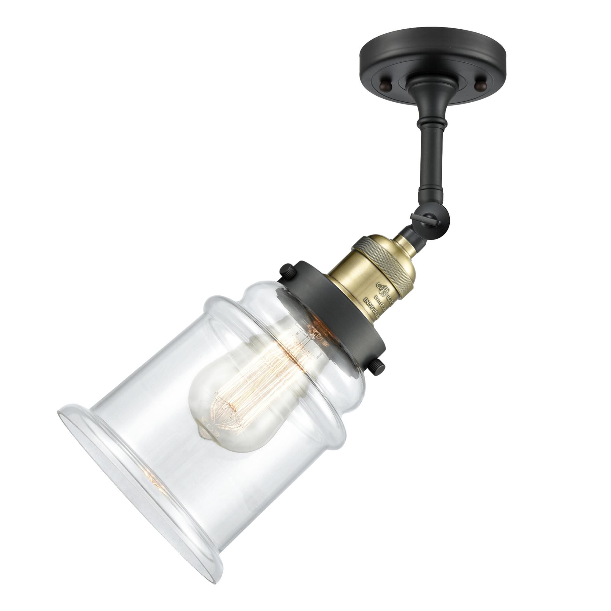 Shown in Black Antique Brass finish and Clear glass and None accent