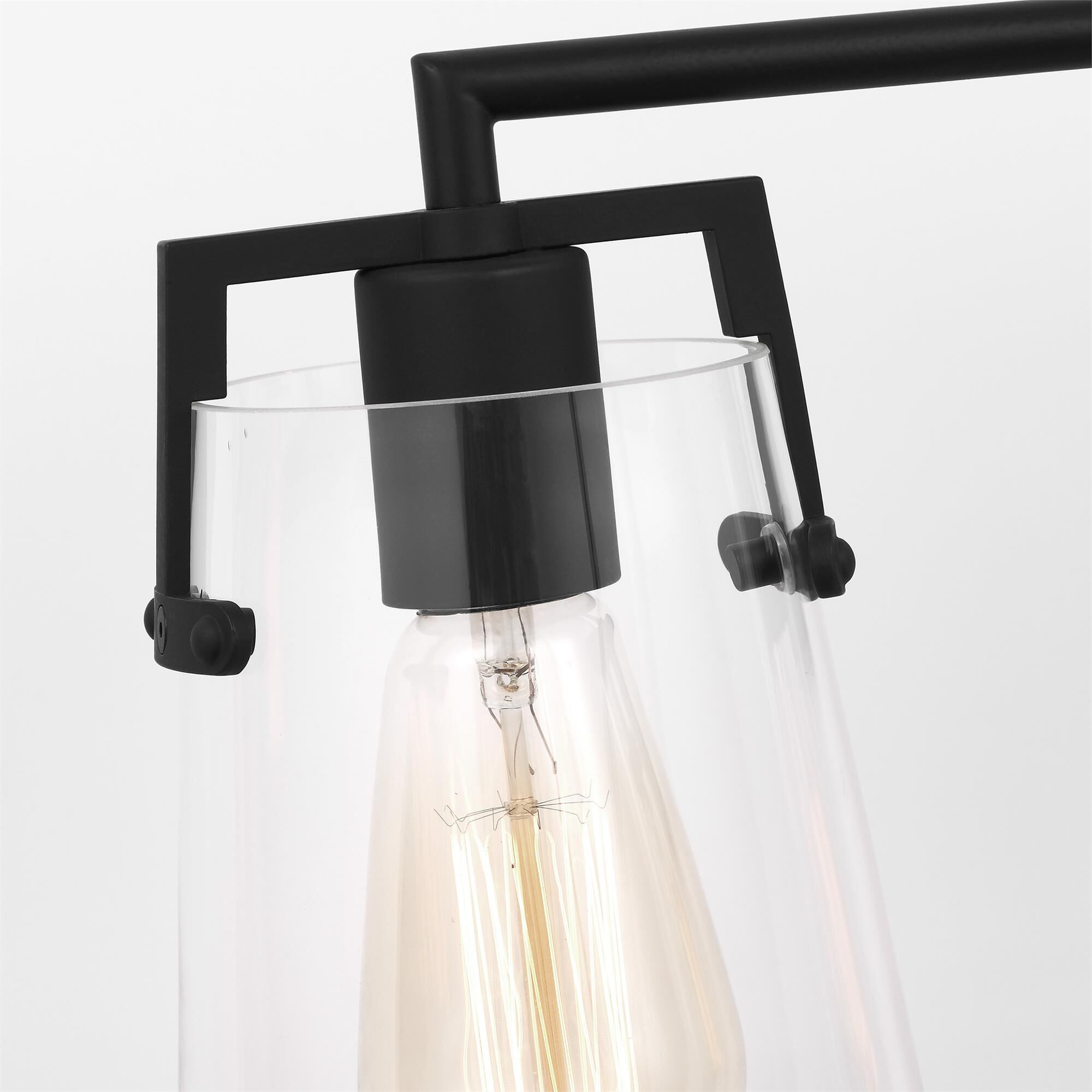 Shown in Midnight Black finish and Clear Glass s shade