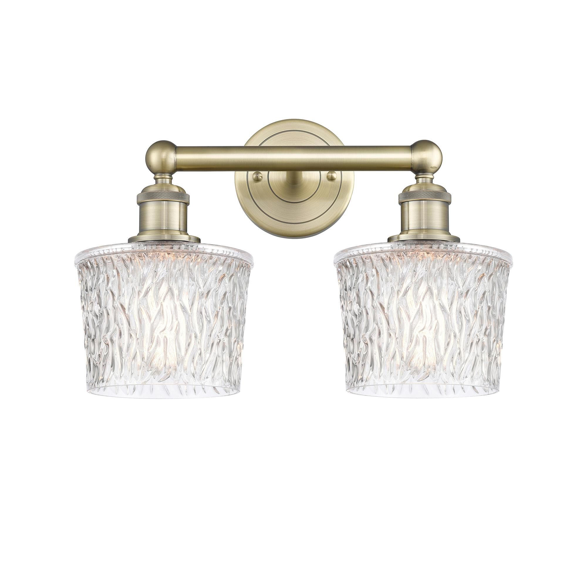 Shown in Antique Brass finish and Clear glass