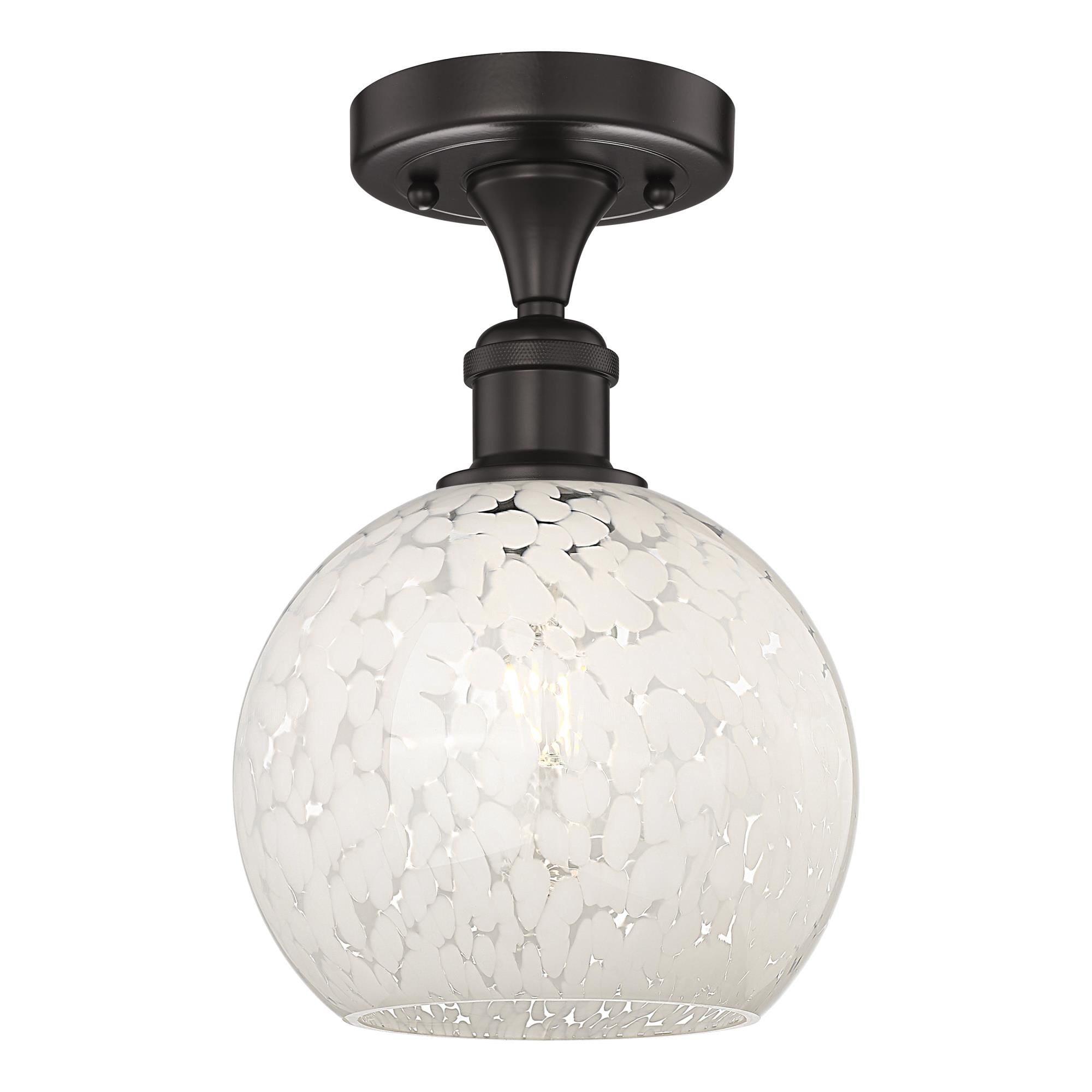 Shown in Oil Rubbed Bronze finish and White Mouchette glass