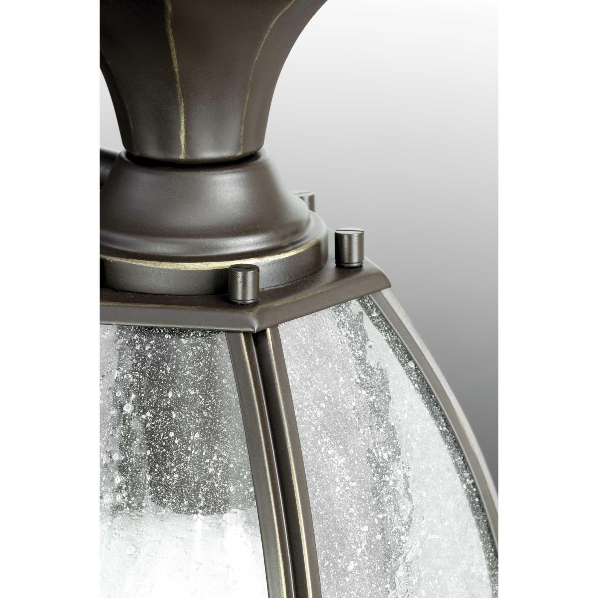 Shown in Antique Bronze finish and Clear Seeded glass