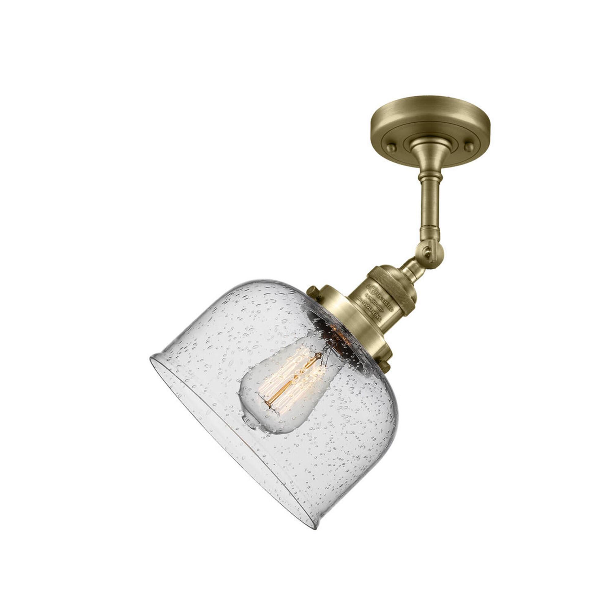 Shown in Antique Brass finish and Seedy Large Bell glass and No Accent accent