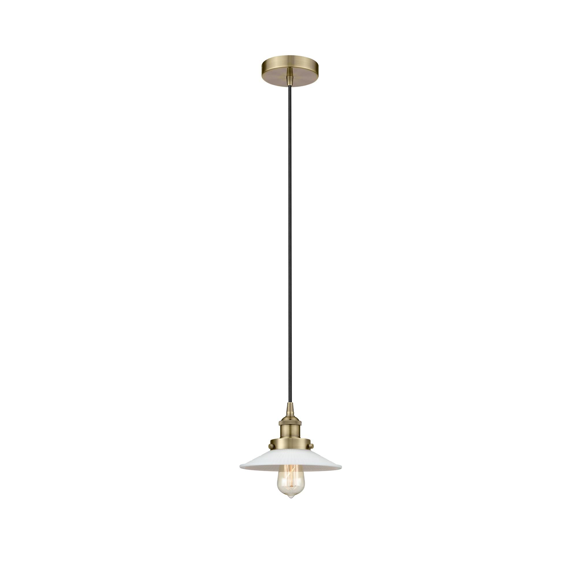 Shown in Antique Brass finish and White glass