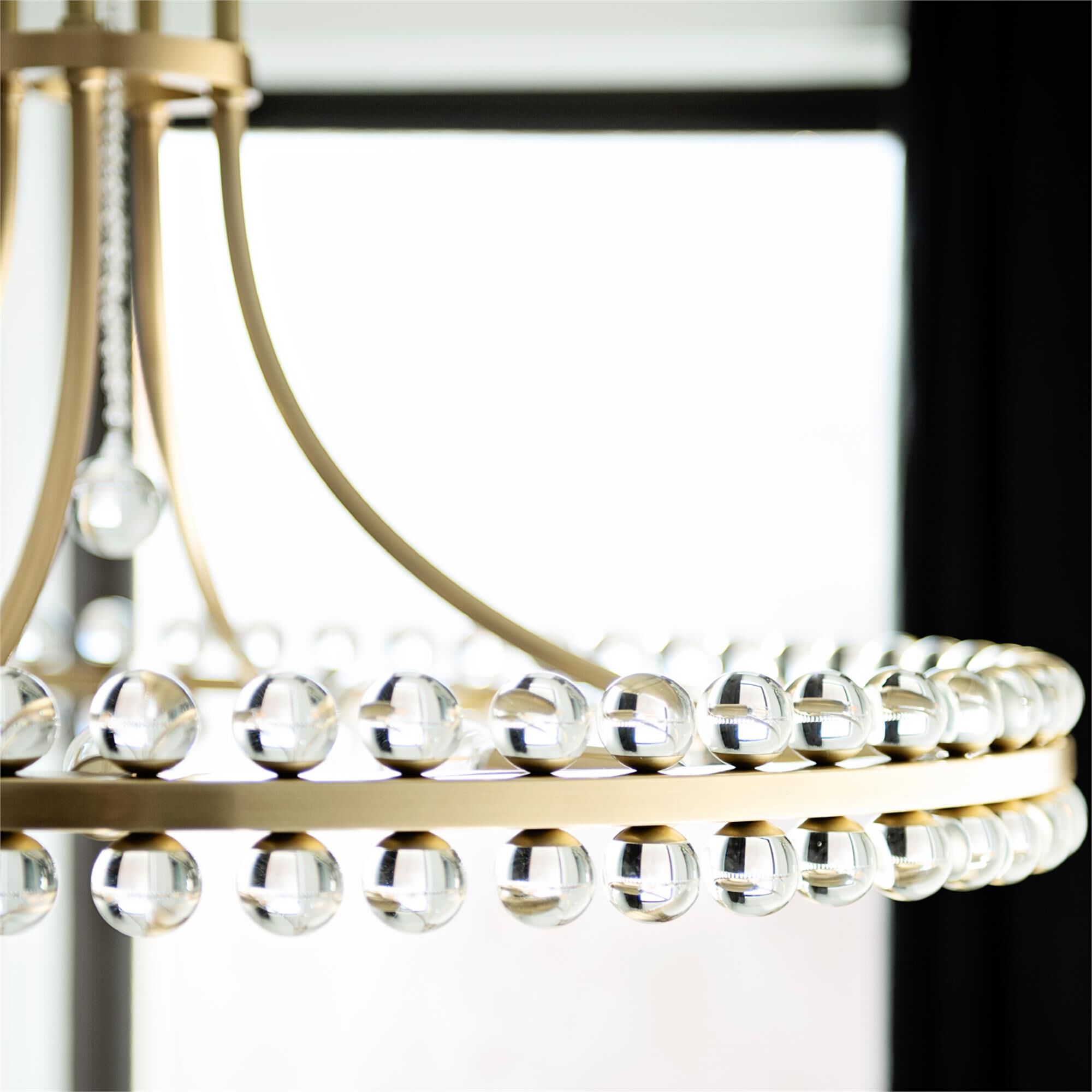 Shown in Aged Brass finish and Glass Ball crystal
