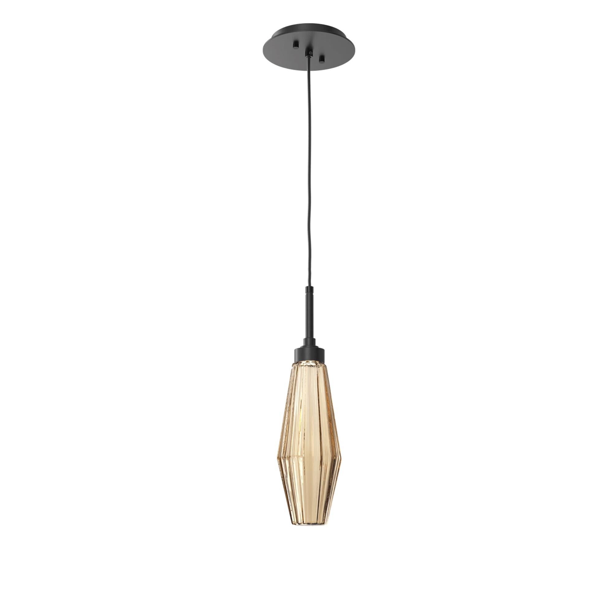 Shown in Matte Black finish and Optic Rib Bronze glass