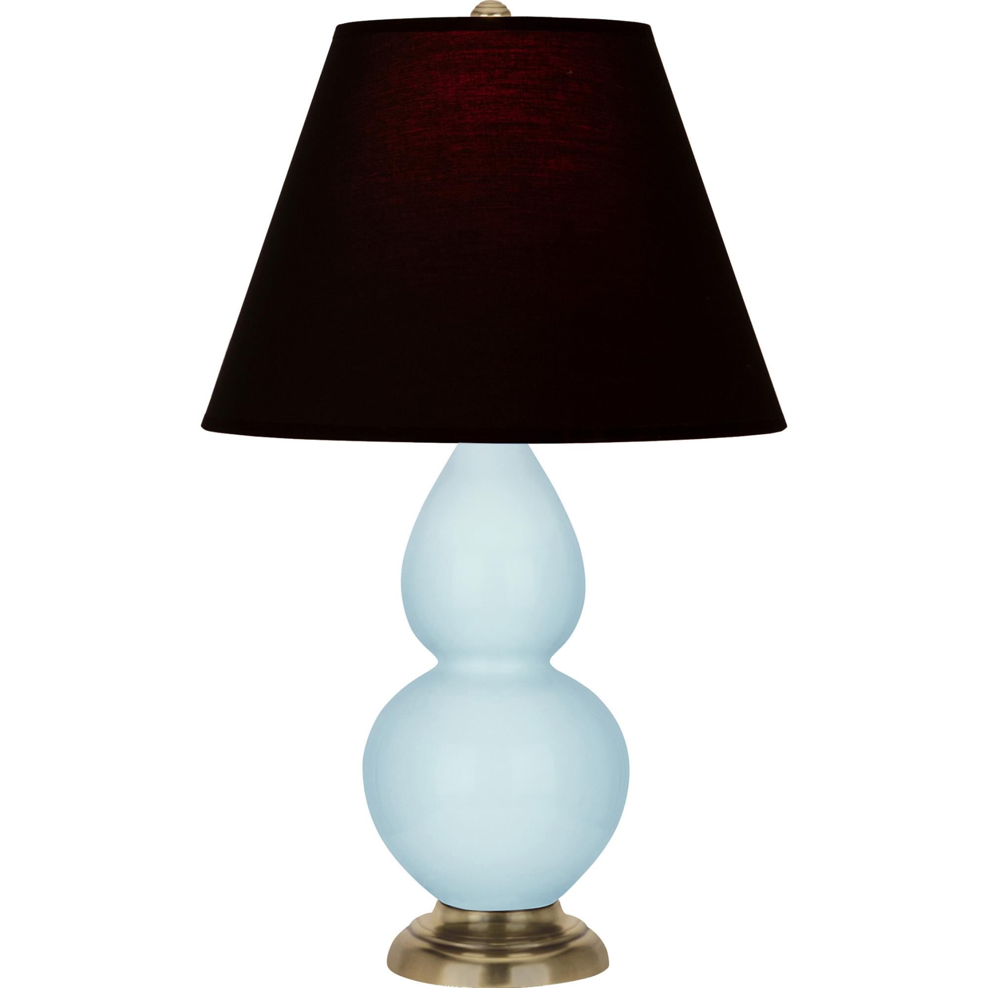 Shown in Baby Blue finish and Ink Black with Rose Red Lining Fabric shade and Antique Natural Brass accent