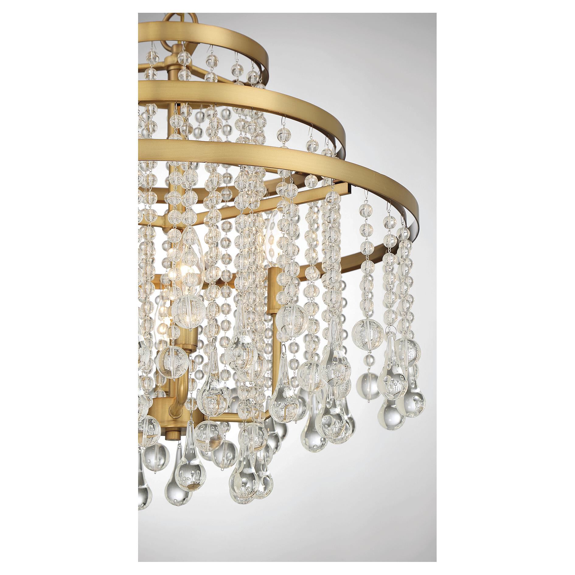 Shown in Warm Brass finish and Clear crystal