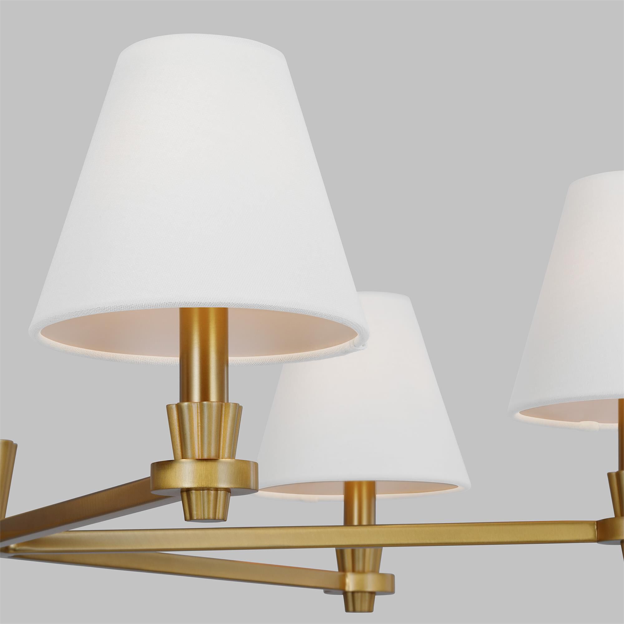 Shown in Burnished Brass finish and White Linen Fabric s shade