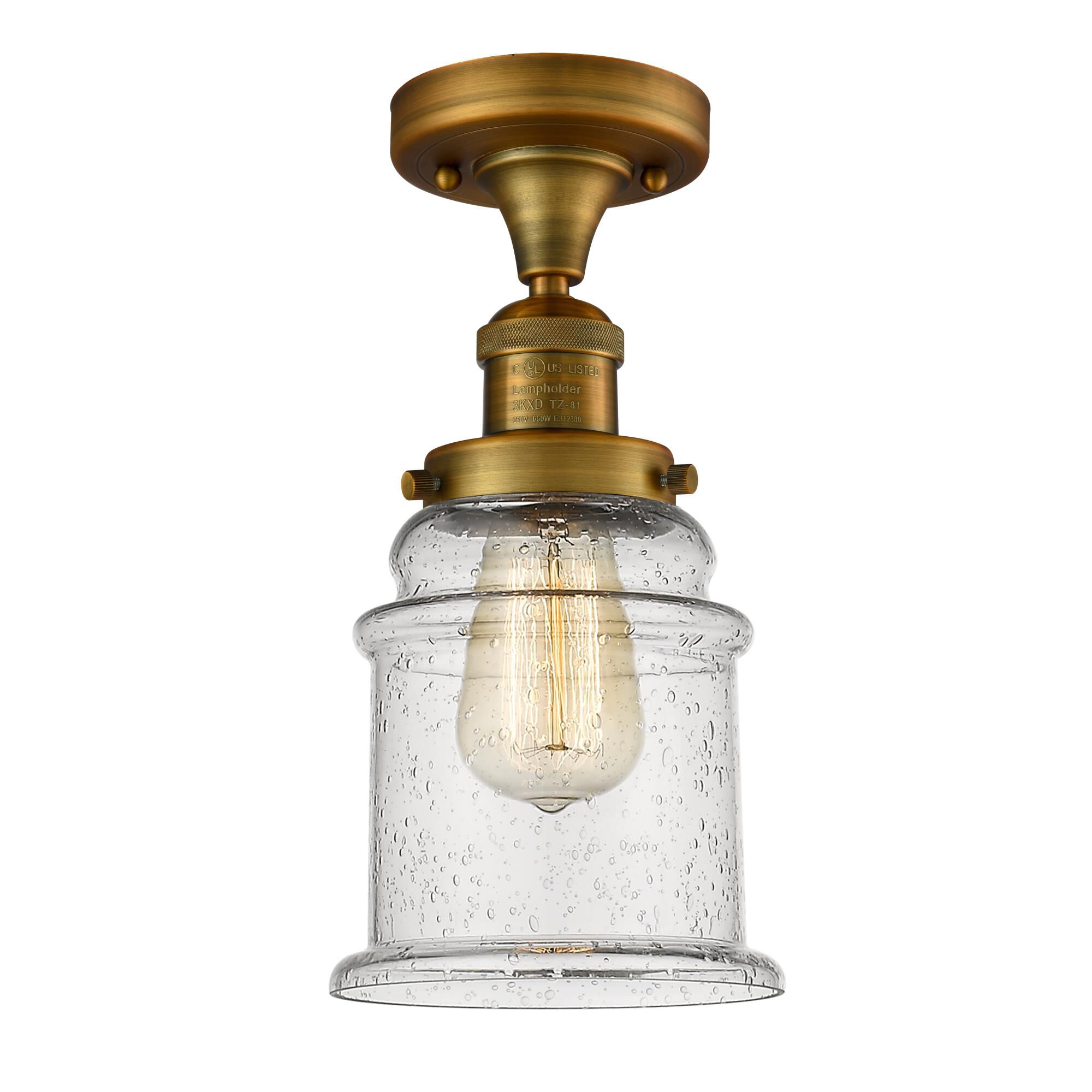 Shown in Brushed Brass finish and Seedy glass