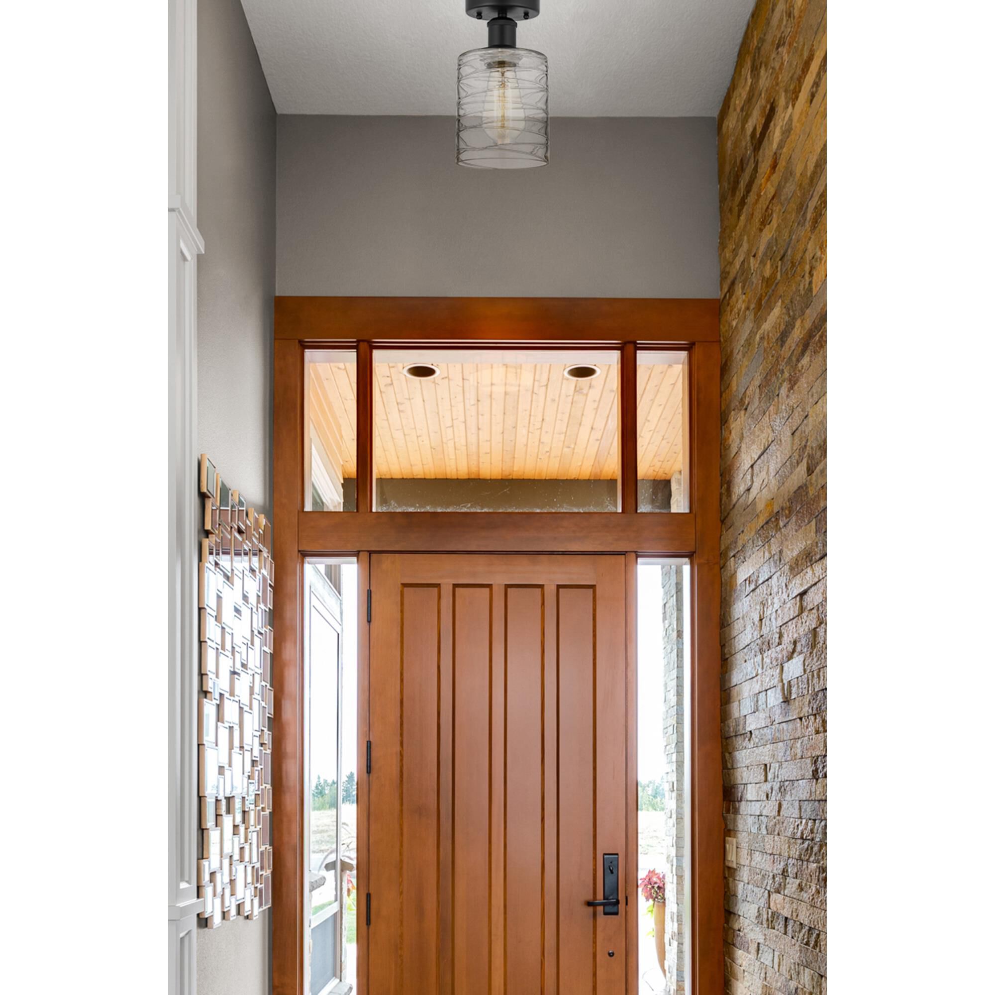 Shown in Matte Black finish and Deco Swirl glass