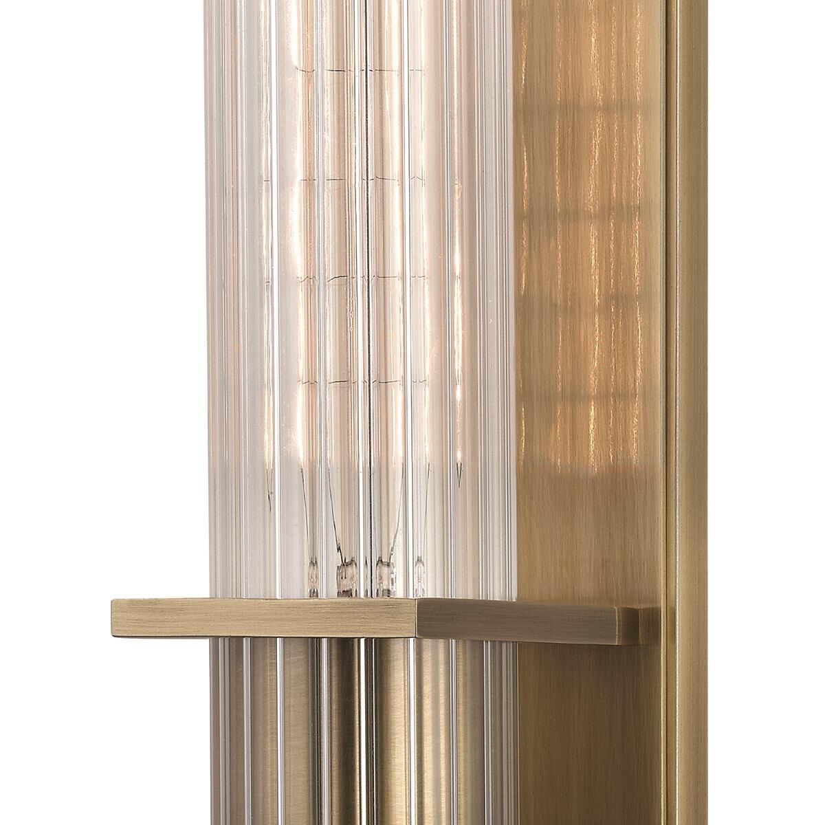Shown in Aged Brass finish and Clear Ribbed glass