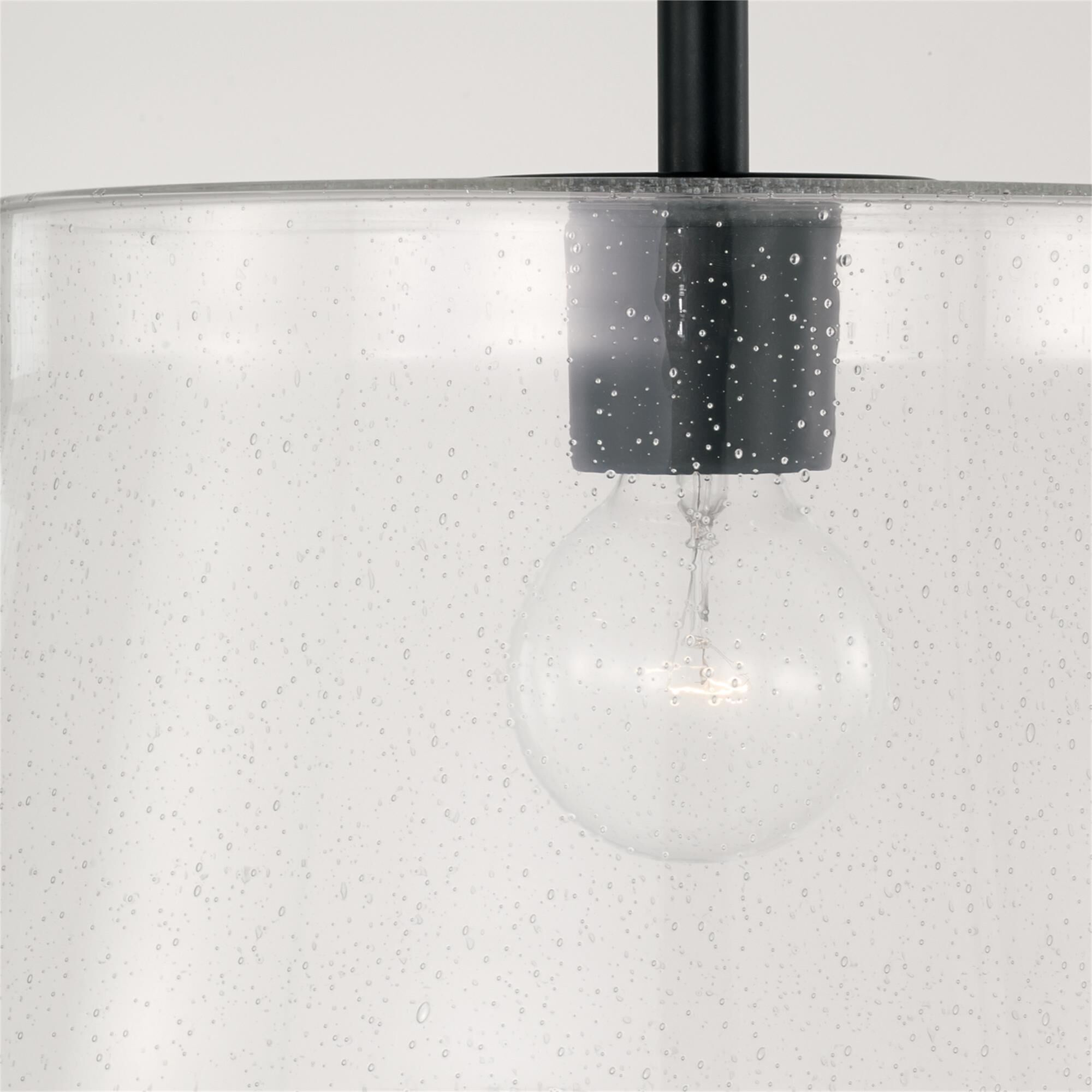 Shown in Matte Black finish and Clear Seeded glass