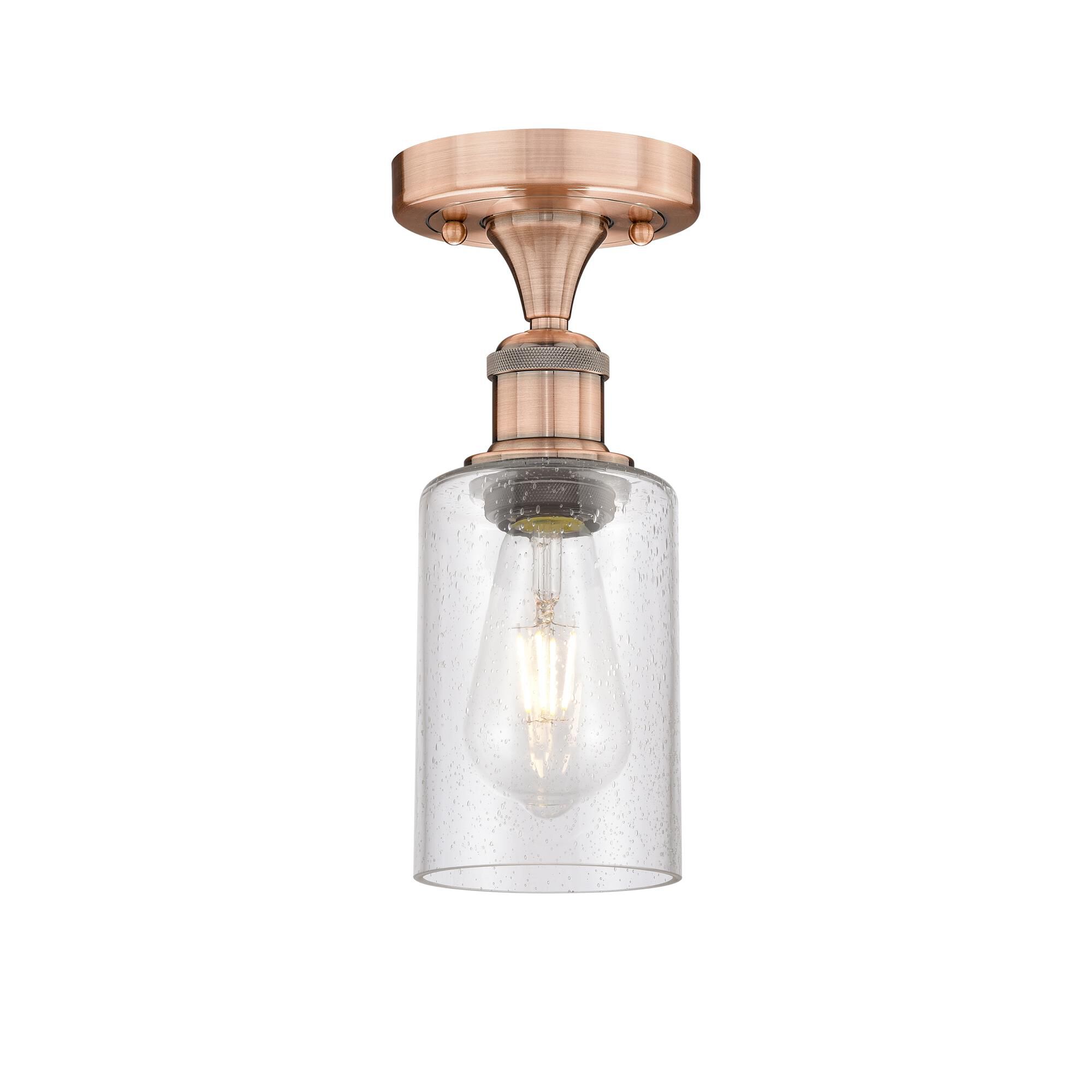 Shown in Antique Copper finish and Seedy glass