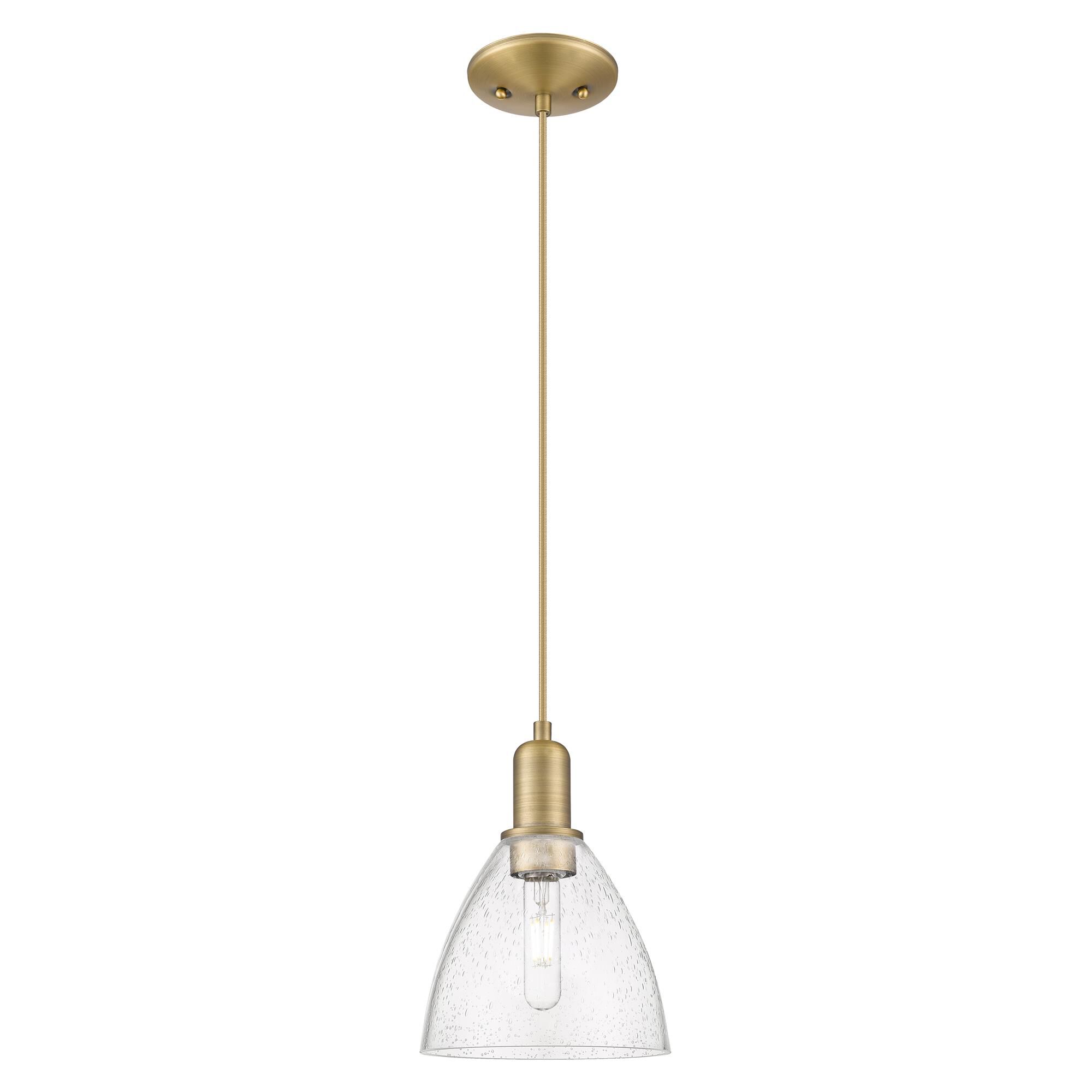 Shown in Brushed Brass finish and Seedy glass