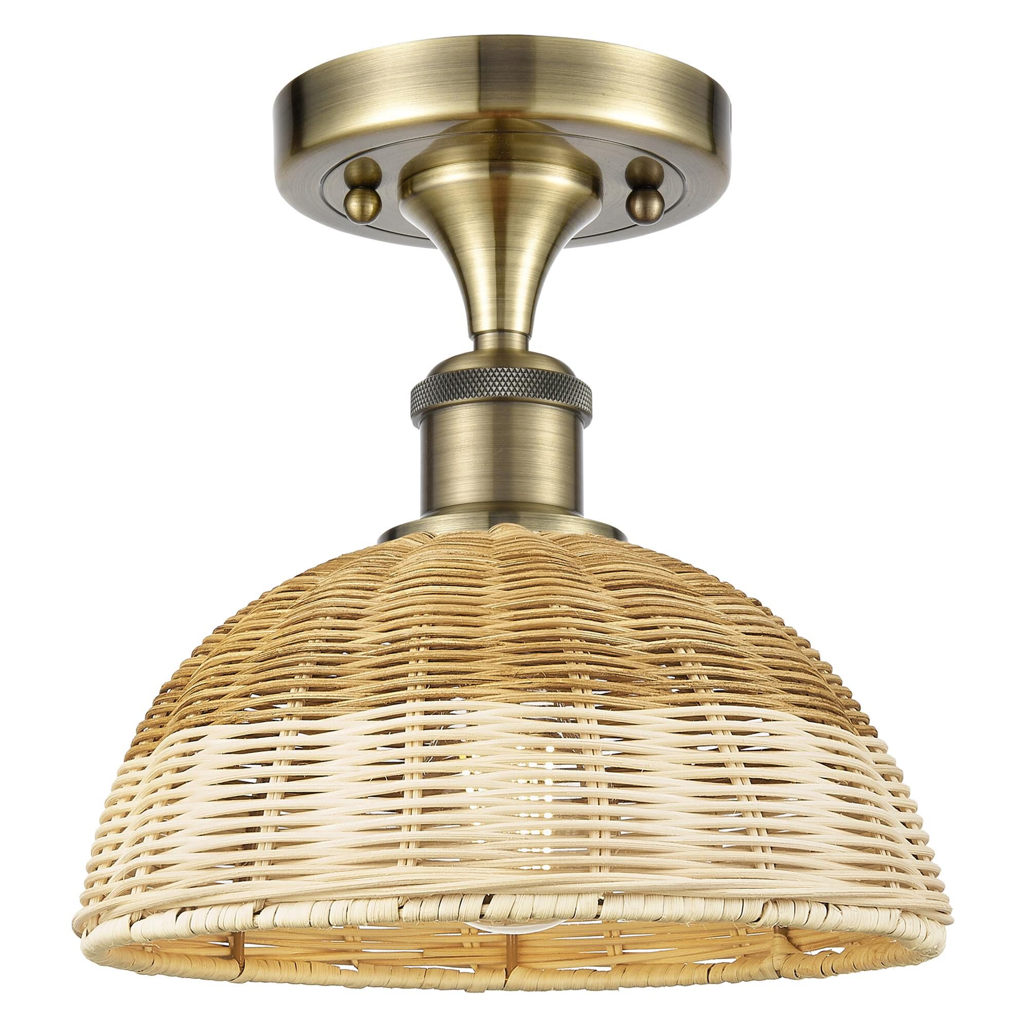 Shown in Antique Brass finish and Natural shade