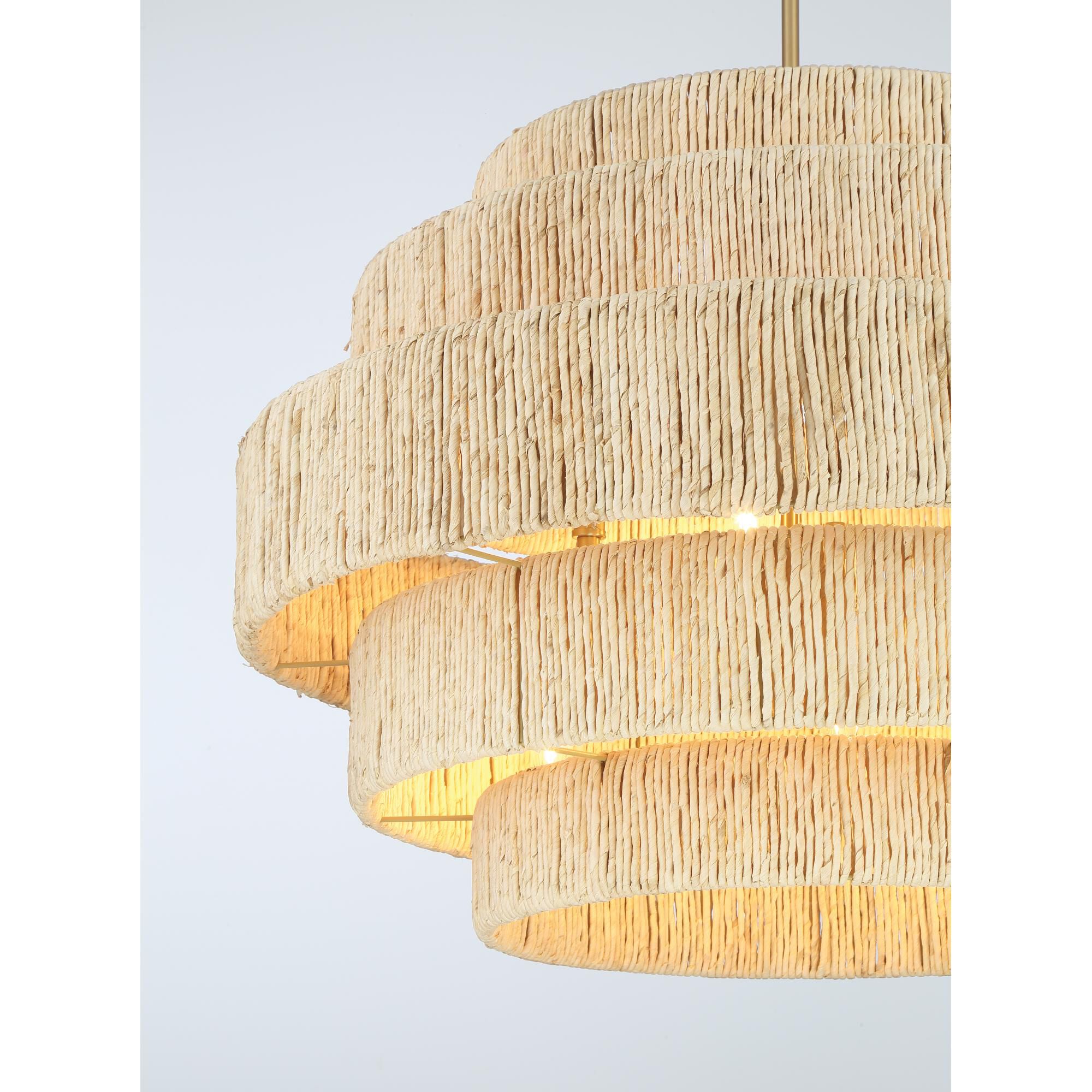 Shown in Signature Brass finish and Natural Abaca shade