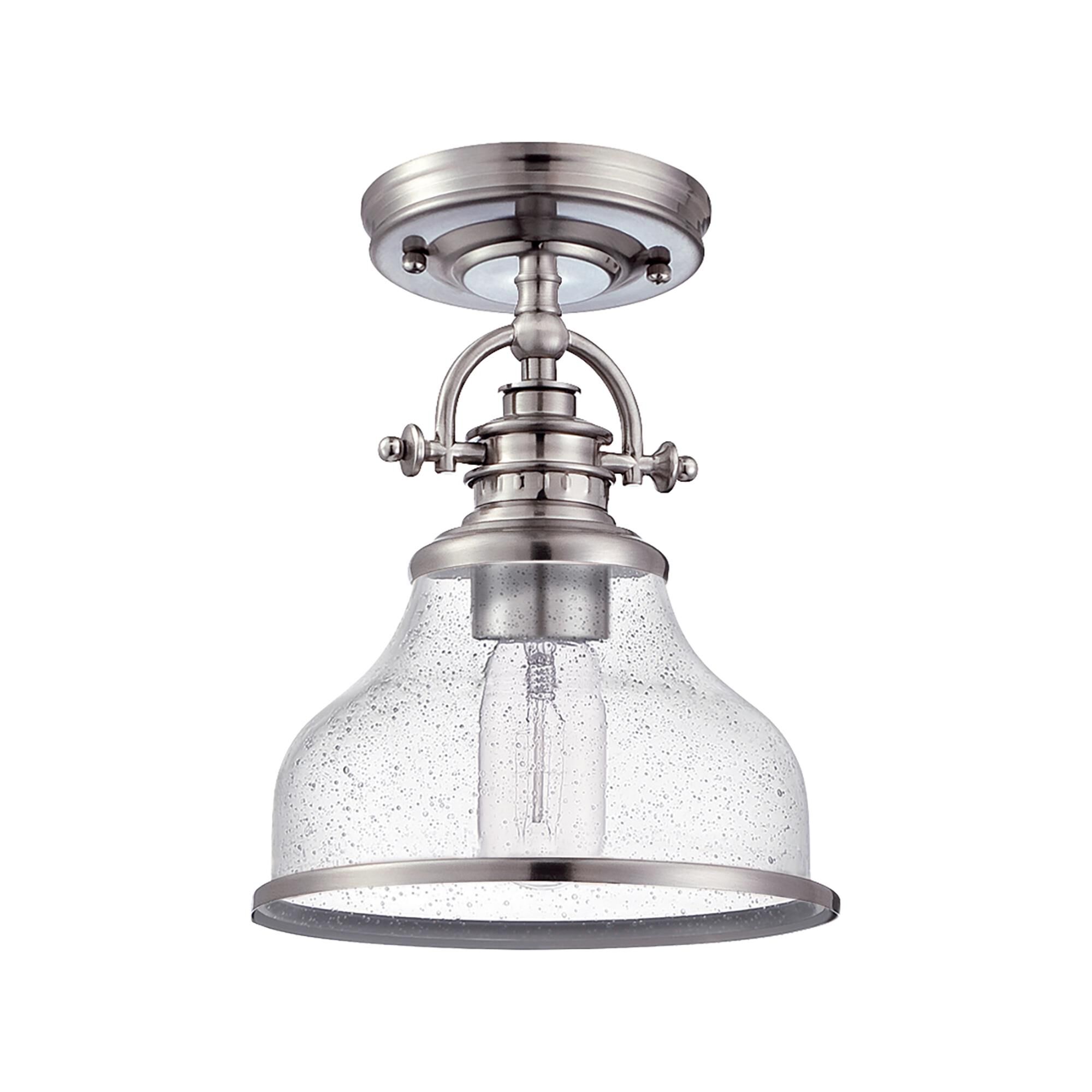 Shown in Brushed Nickel finish and Clear Seeded Glass shade