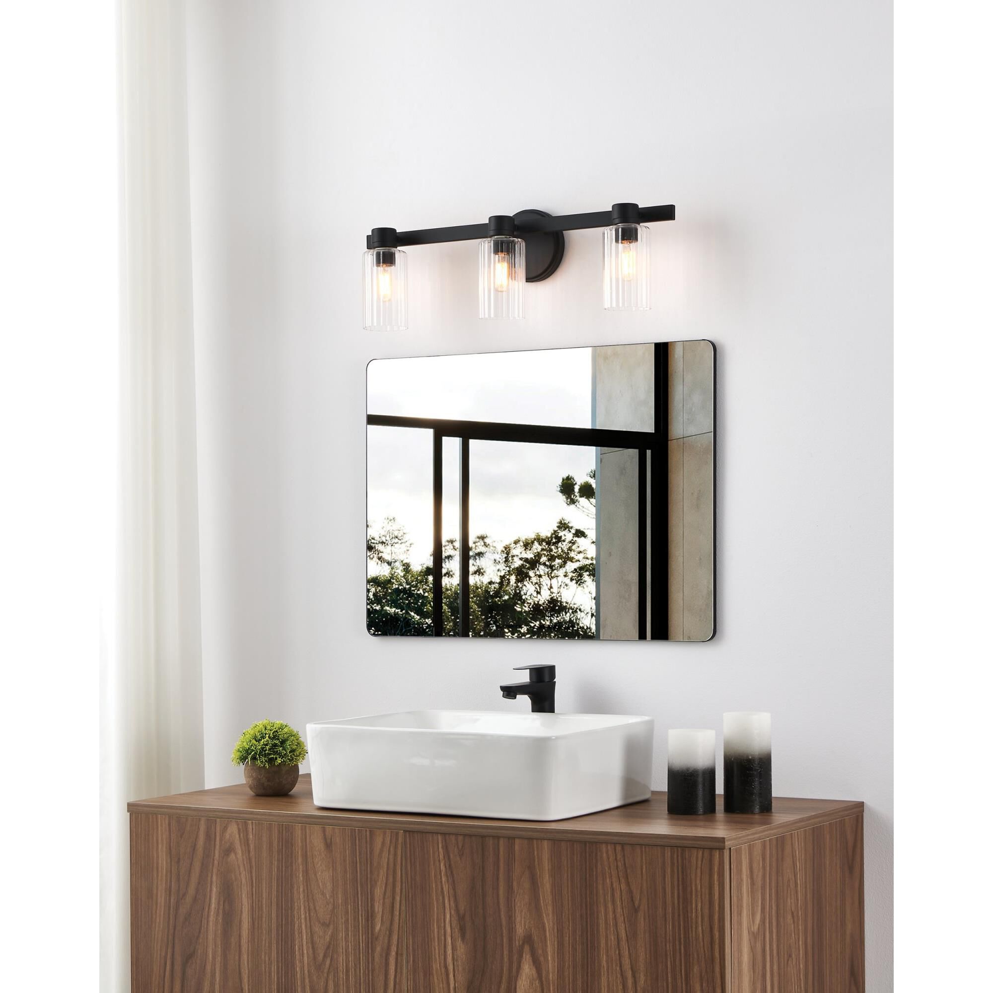 Shown in Matte Black finish and Clear Ribbed glass