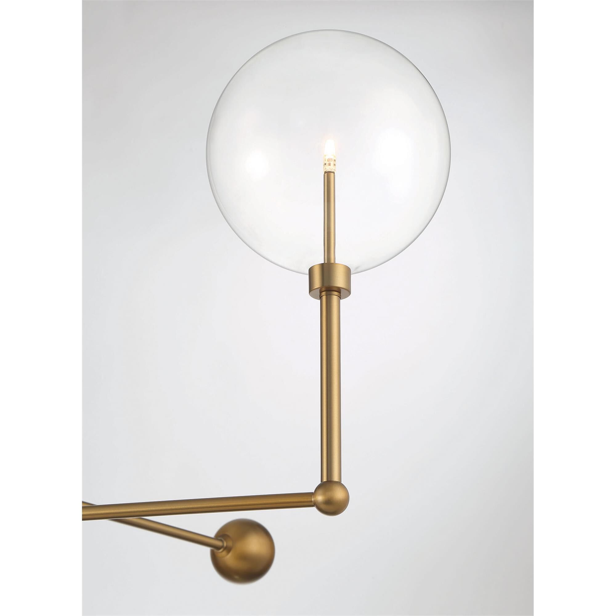Shown in Natural Brass finish and Clear glass