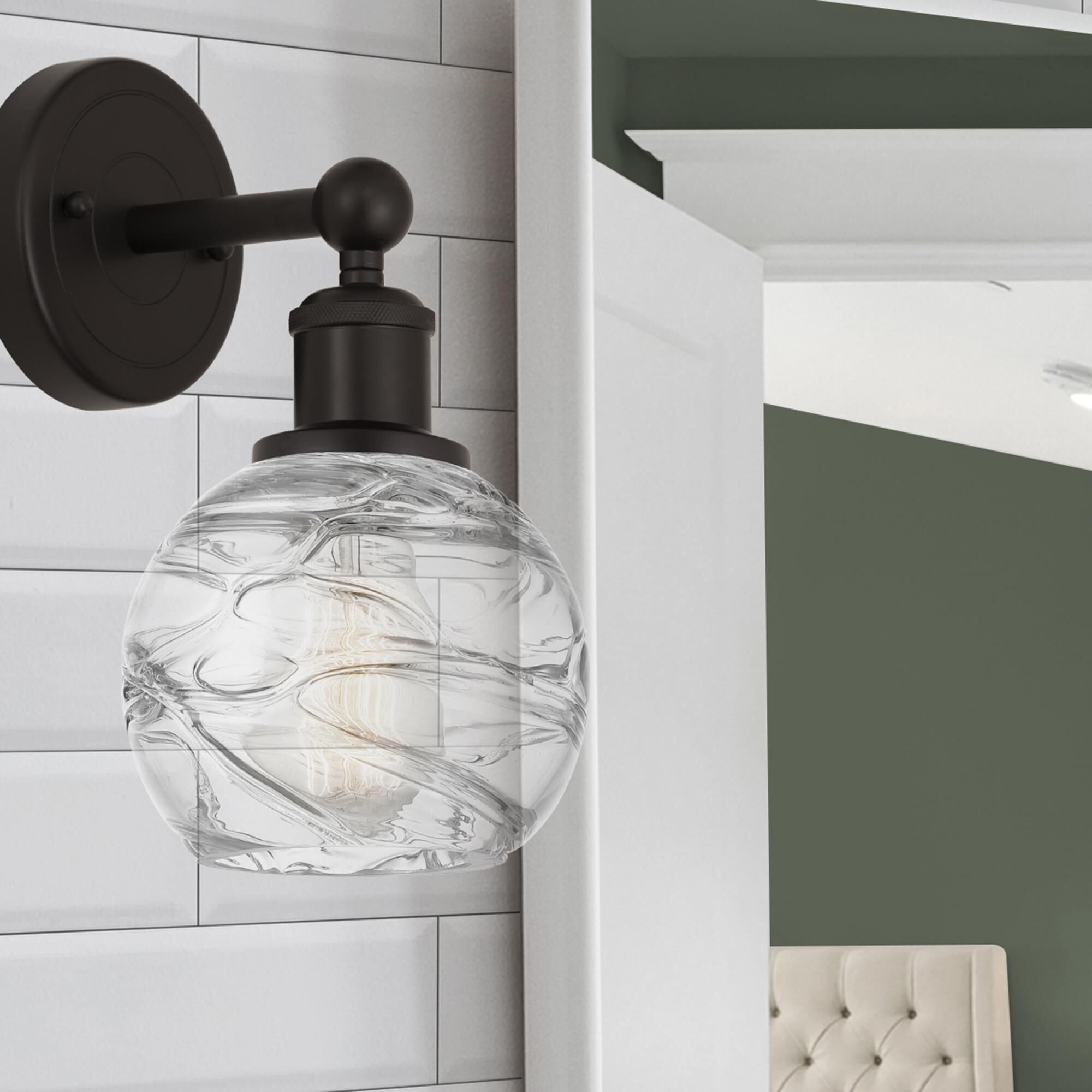 Shown in Oil Rubbed Bronze  finish and Clear Deco Swirl glass