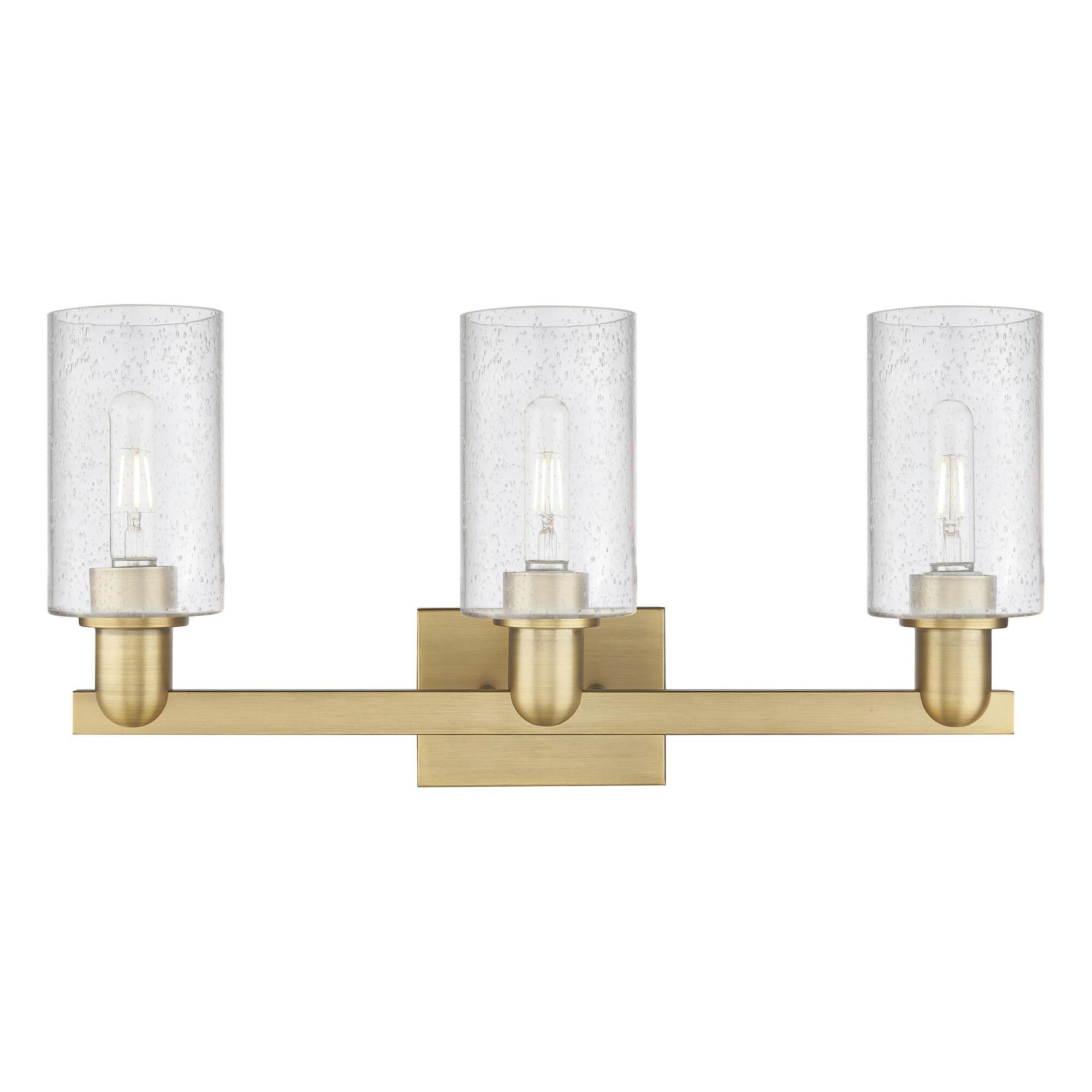Shown in Brushed Brass finish and Seedy glass