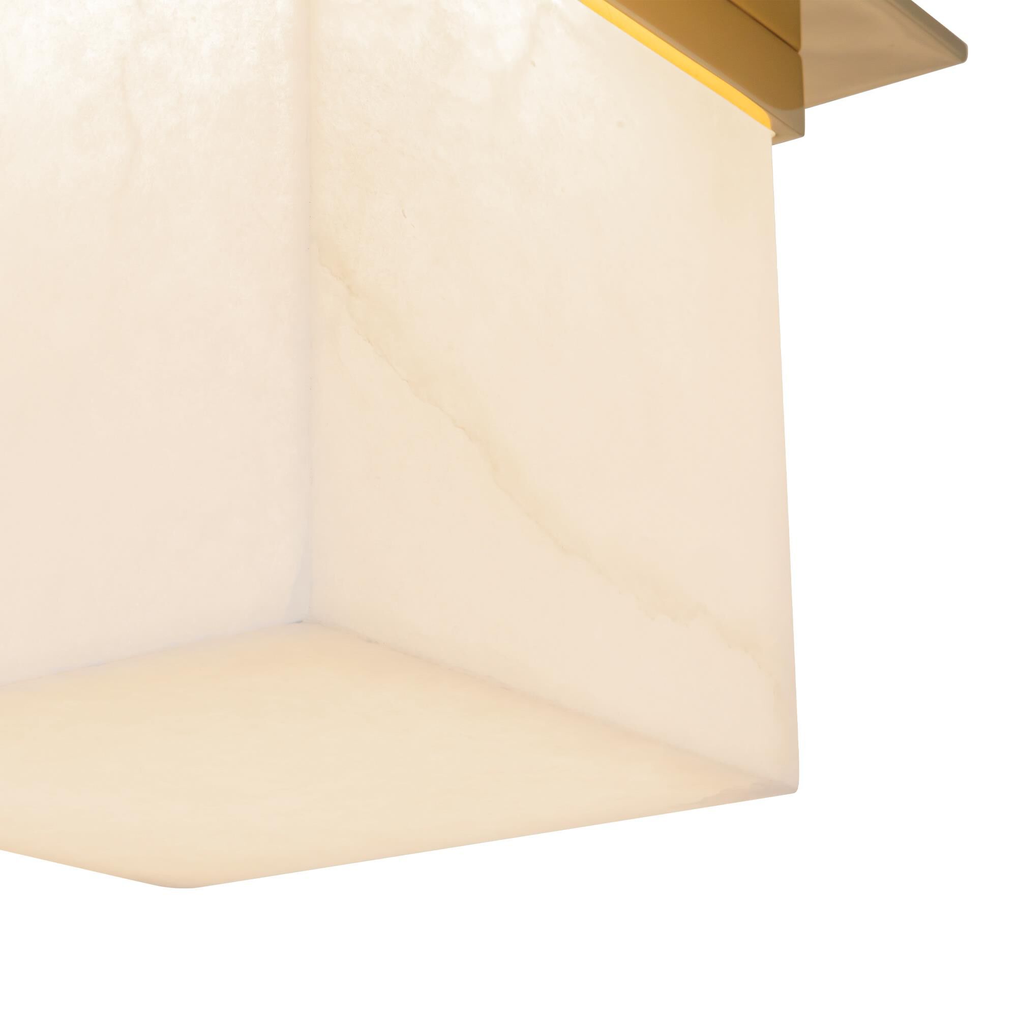 Shown in Patina Brass finish and Alabaster glass