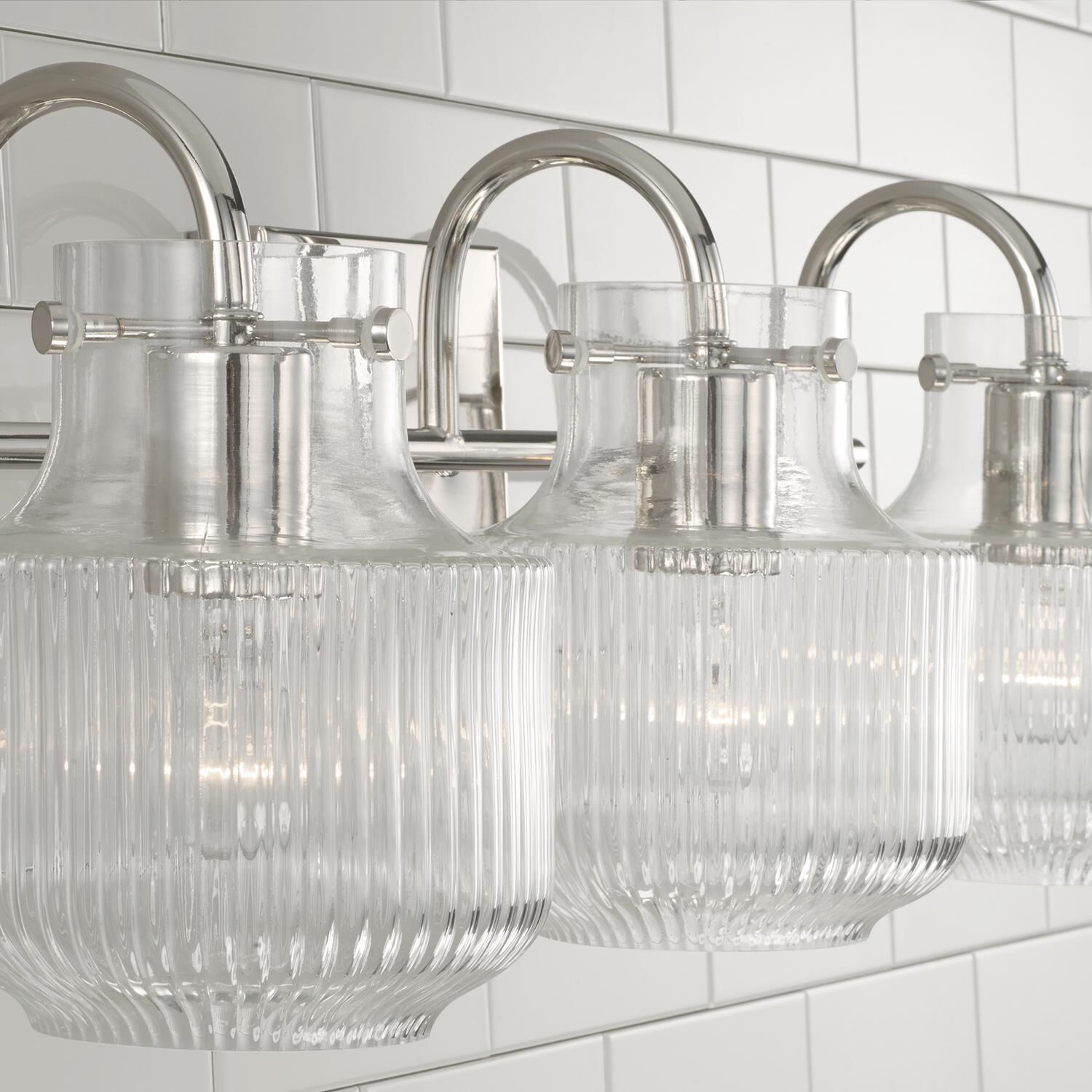 Shown in Polished Nickel finish and Clear Fluted glass