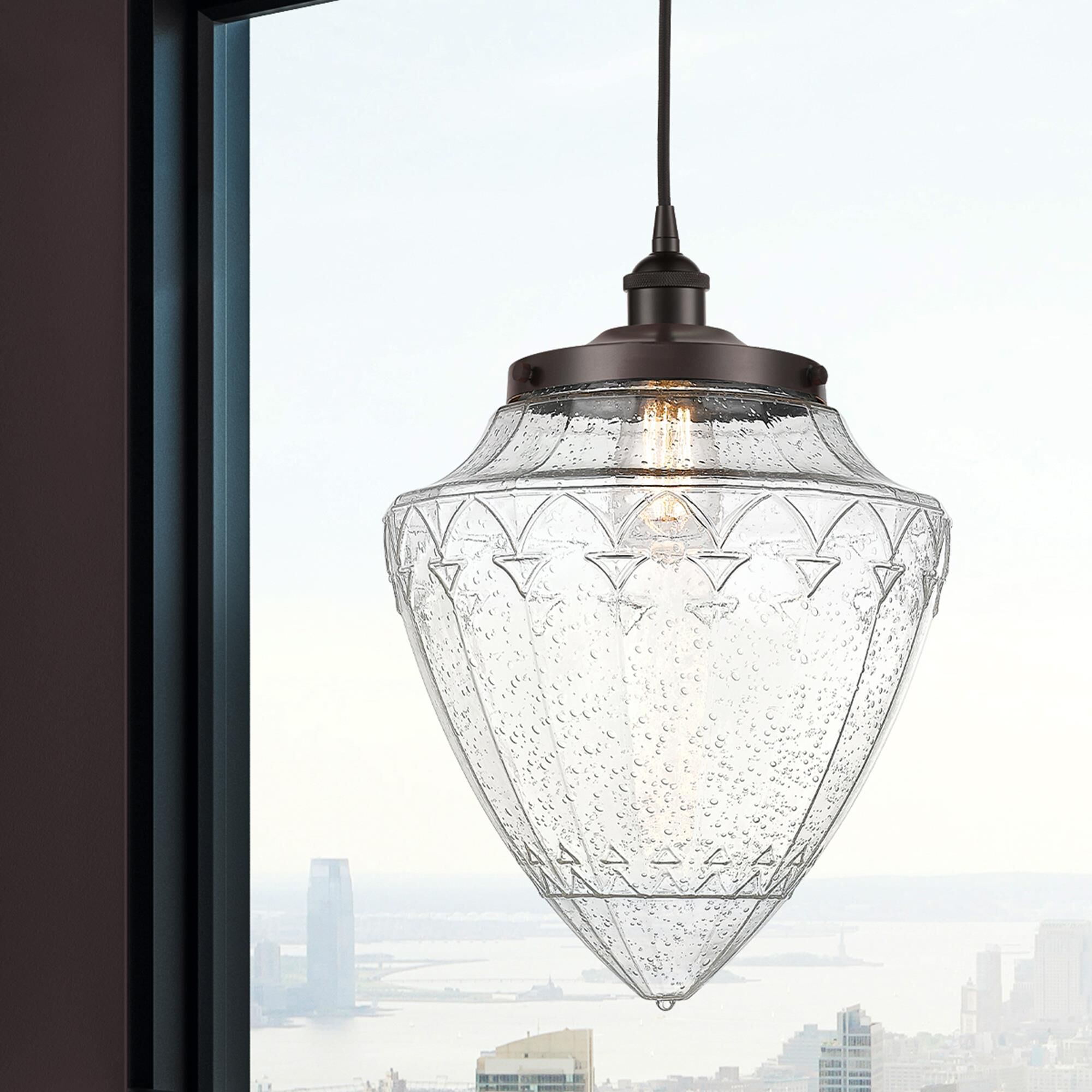 Shown in Oil Rubbed Bronze finish and Seedy glass