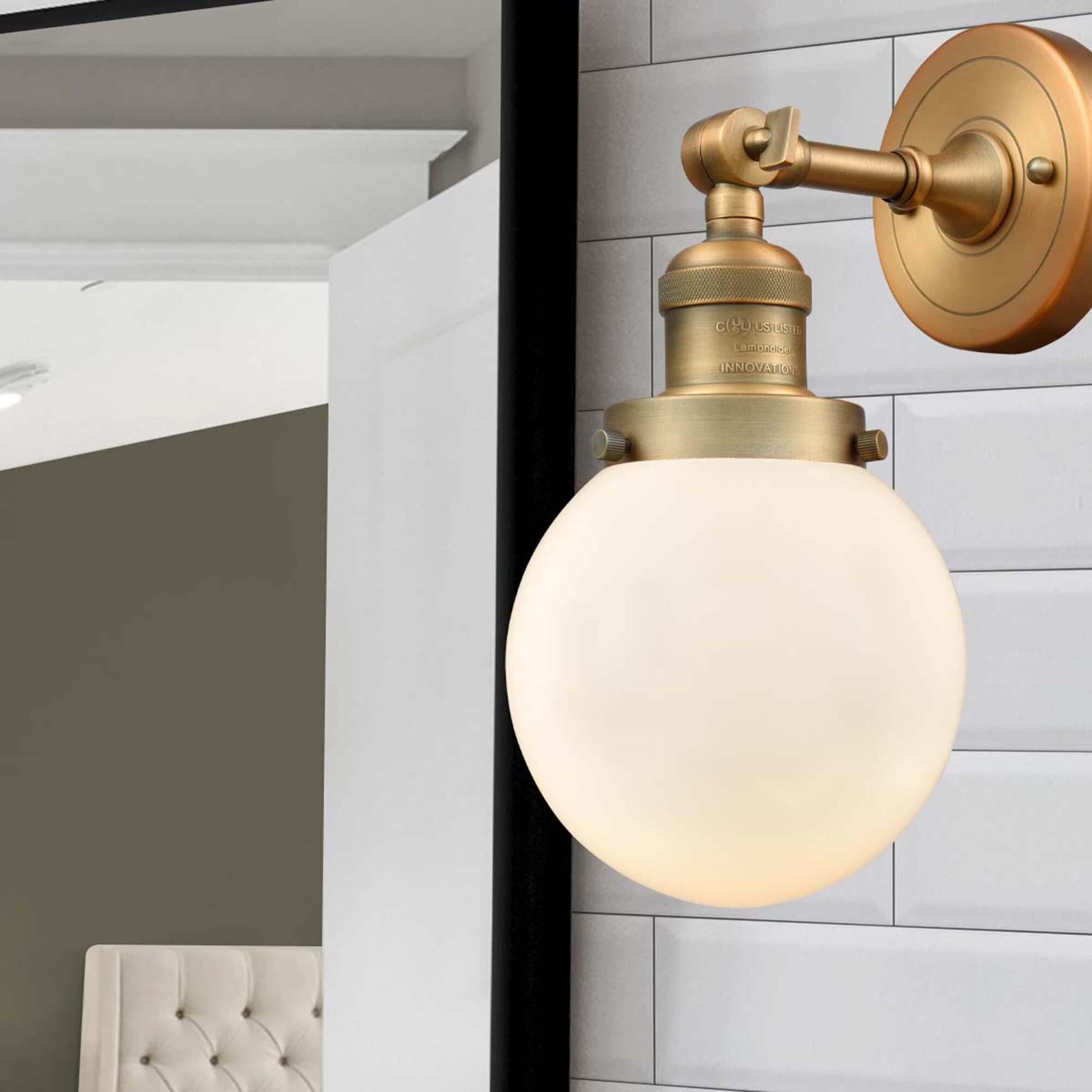 Shown in Brushed Brass finish and Matte White Cased glass and No Accent accent