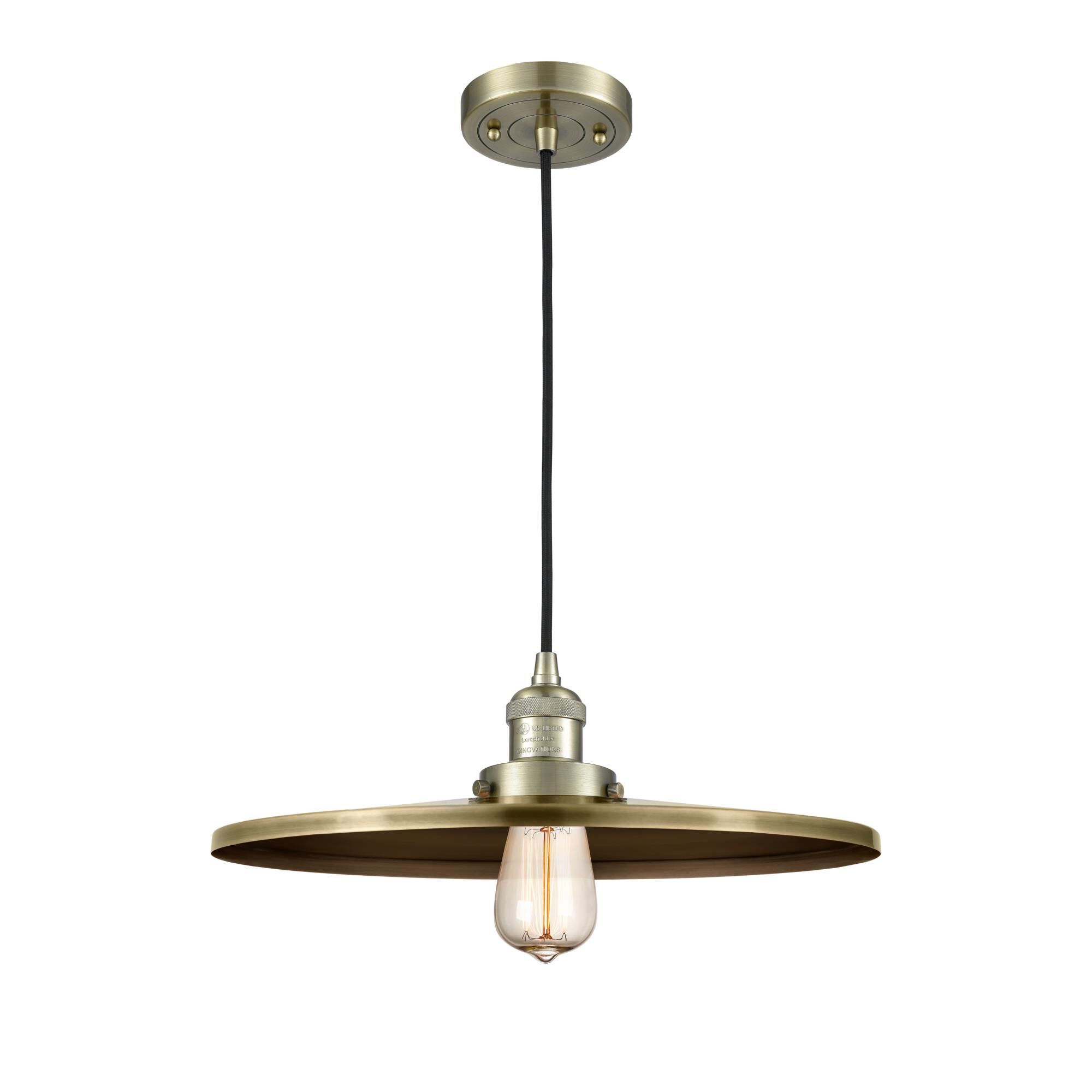Shown in Antique Brass finish and Antique Brass shade