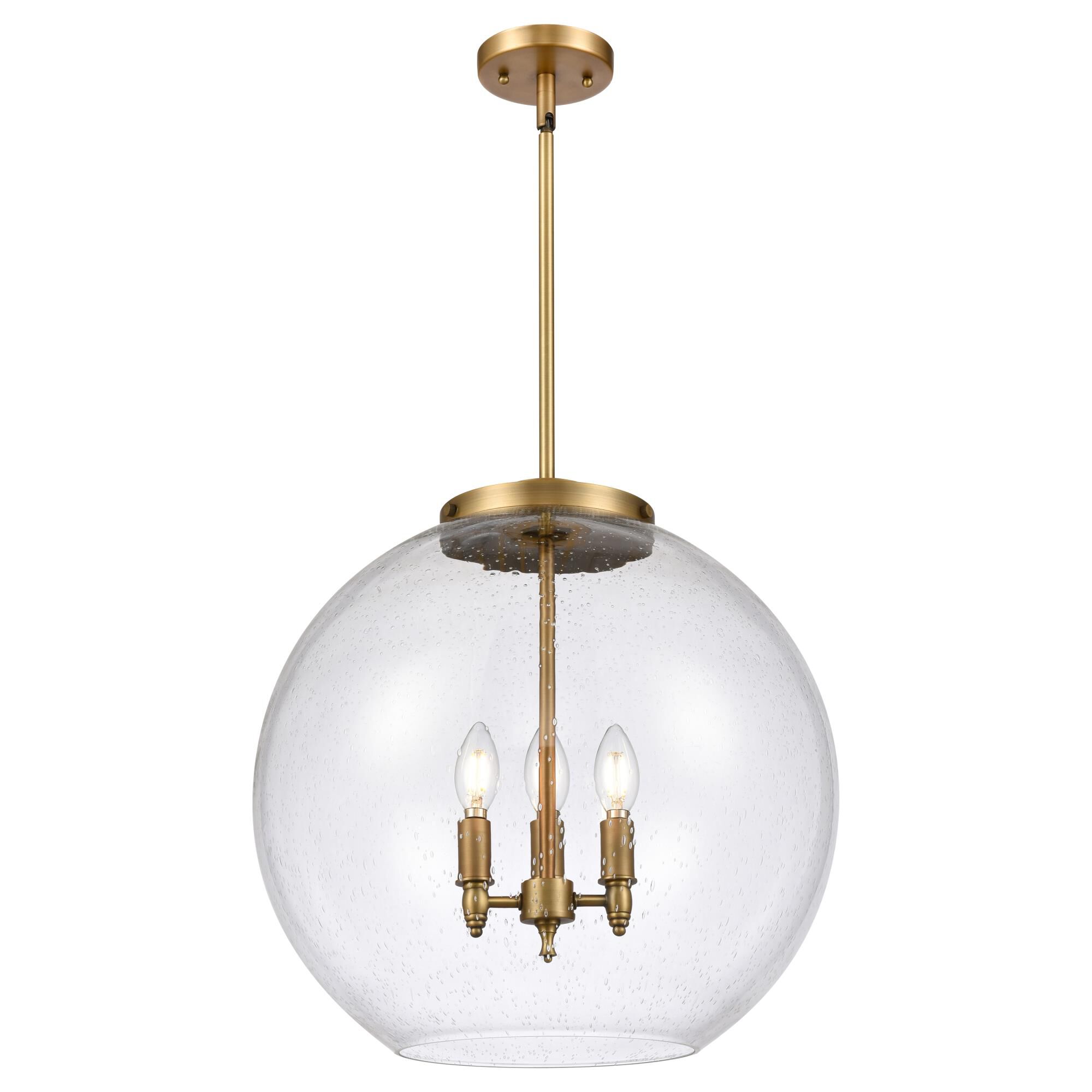 Shown in Brushed Brass finish and Seedy glass