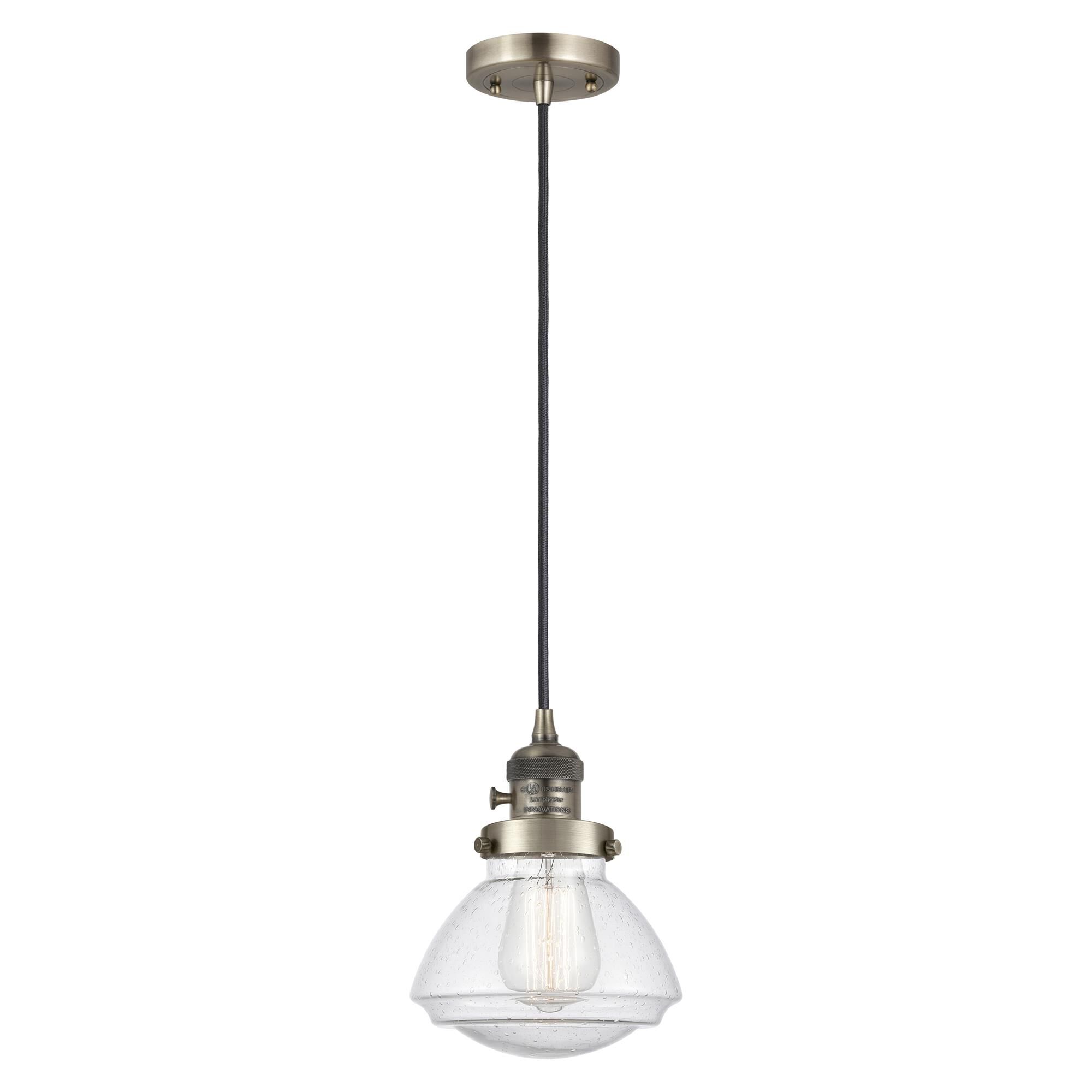 Shown in Antique Brass finish and Seedy glass