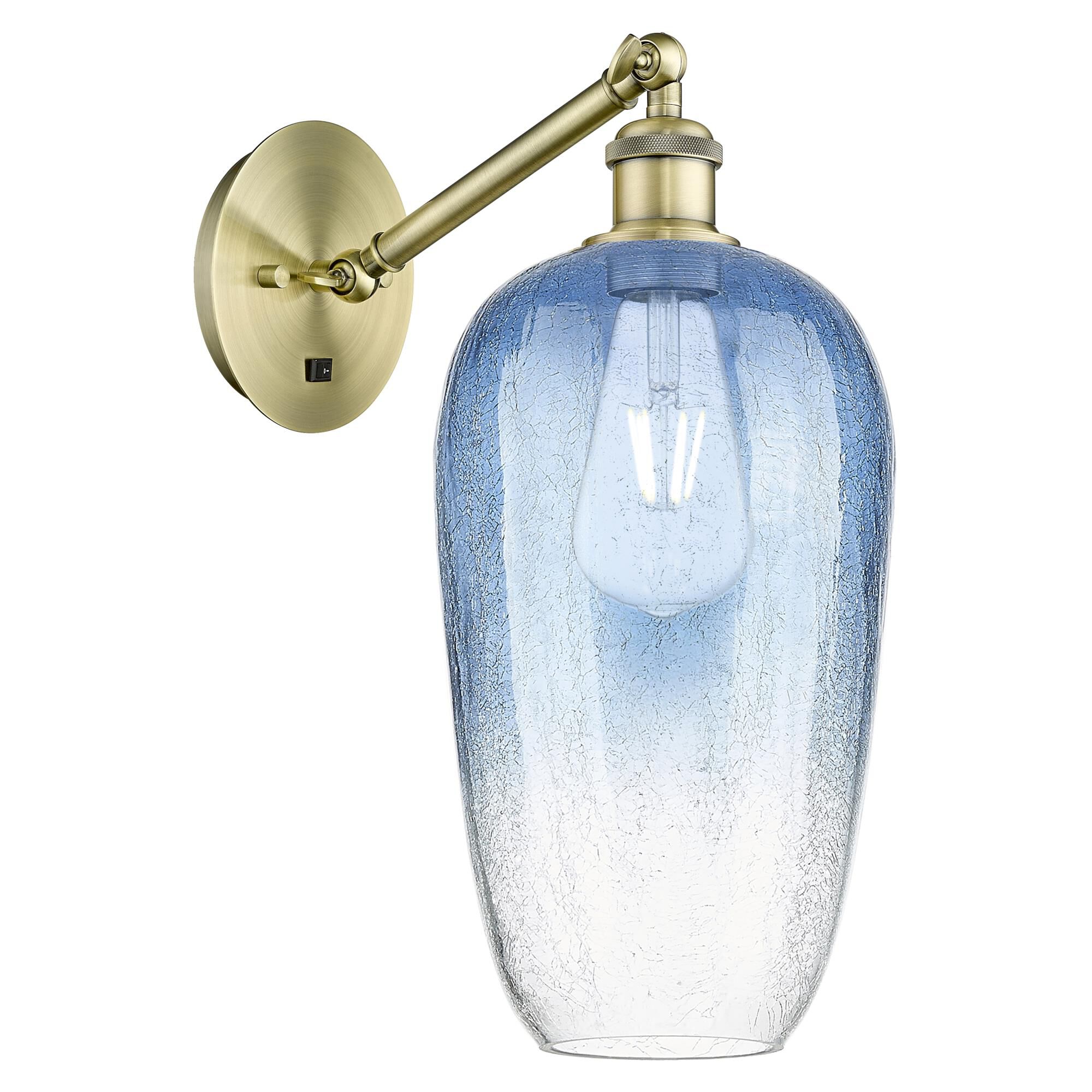 Shown in Antique Brass finish and Sapphire Blue glass