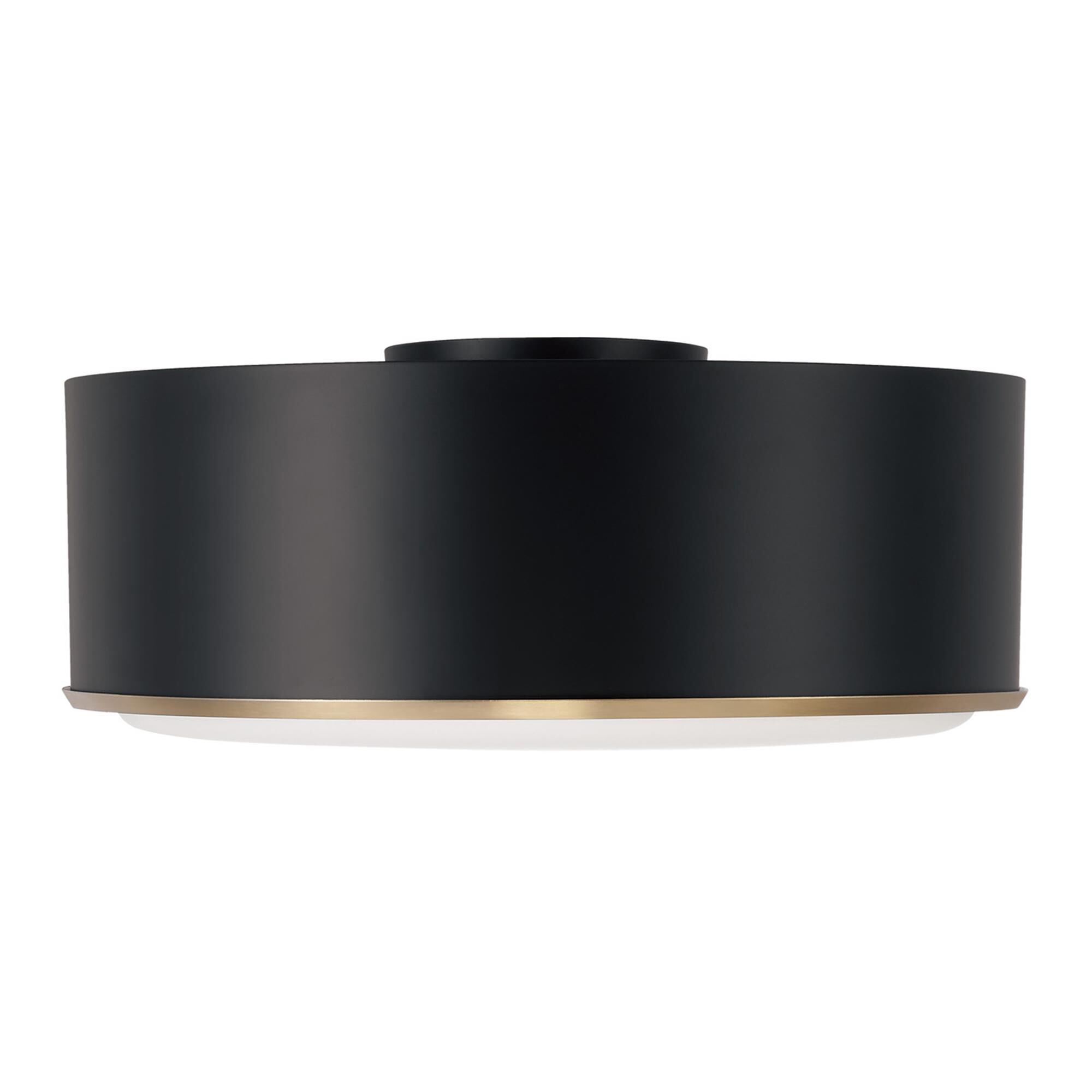 Shown in Matte Brass And Black finish and Soft White glass