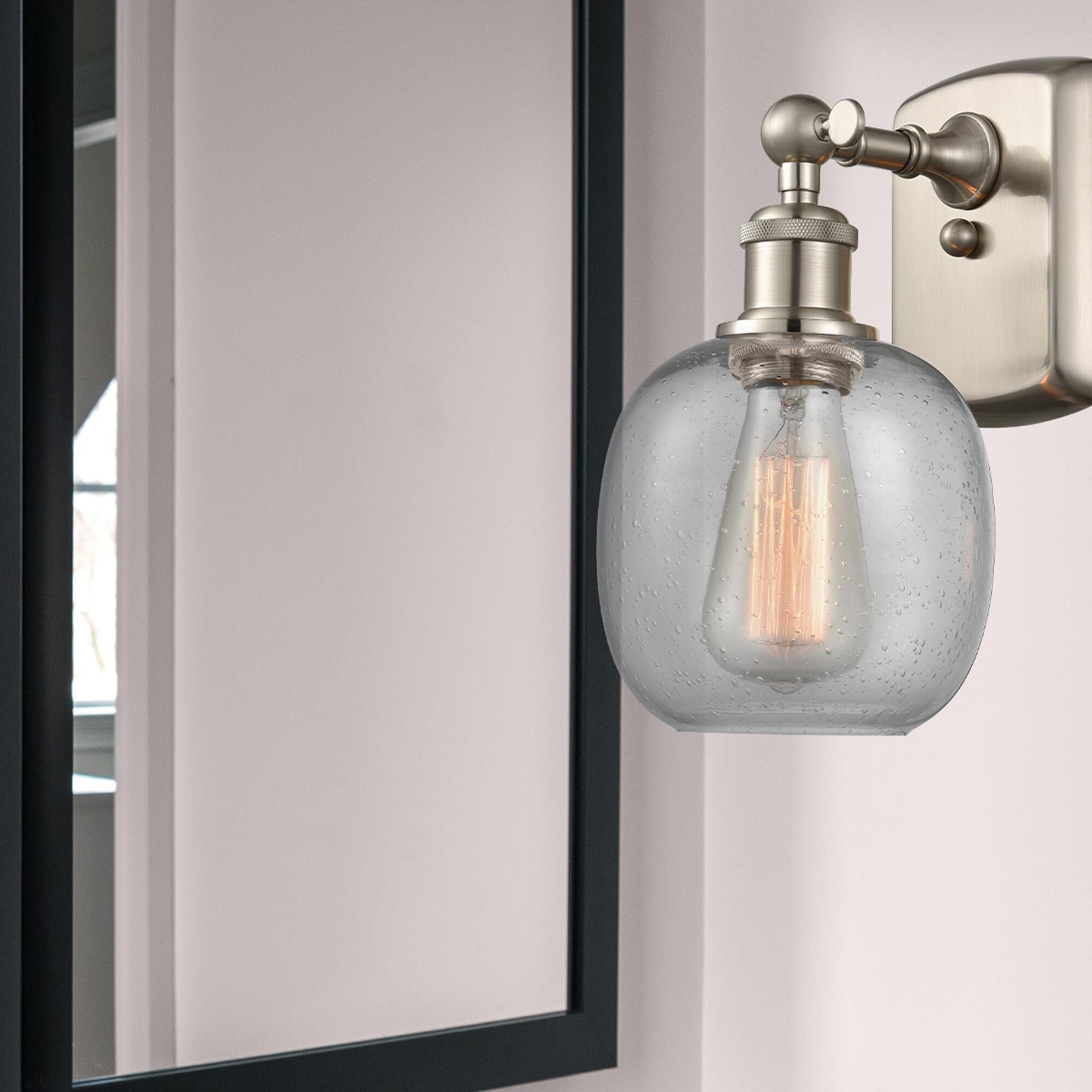 Shown in Brushed Satin Nickel finish and Clear Seedy glass