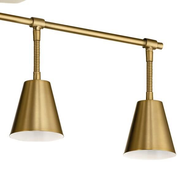 Shown in Brushed Natural Brass finish and Metal shade