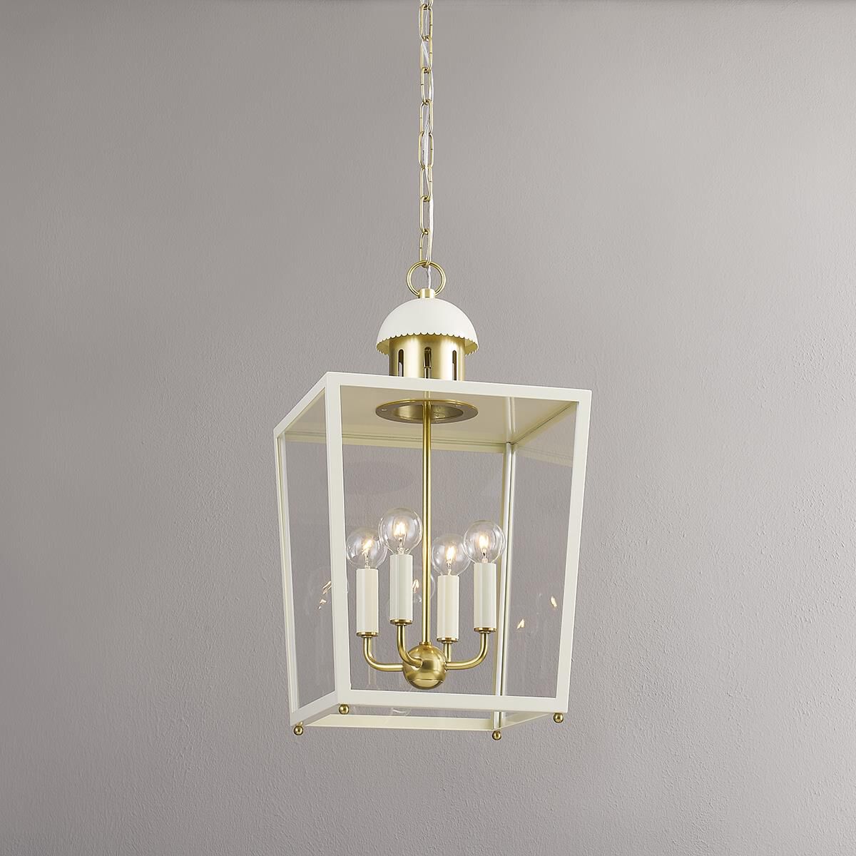 Shown in Aged Brass and Soft Cream finish and Clear glass