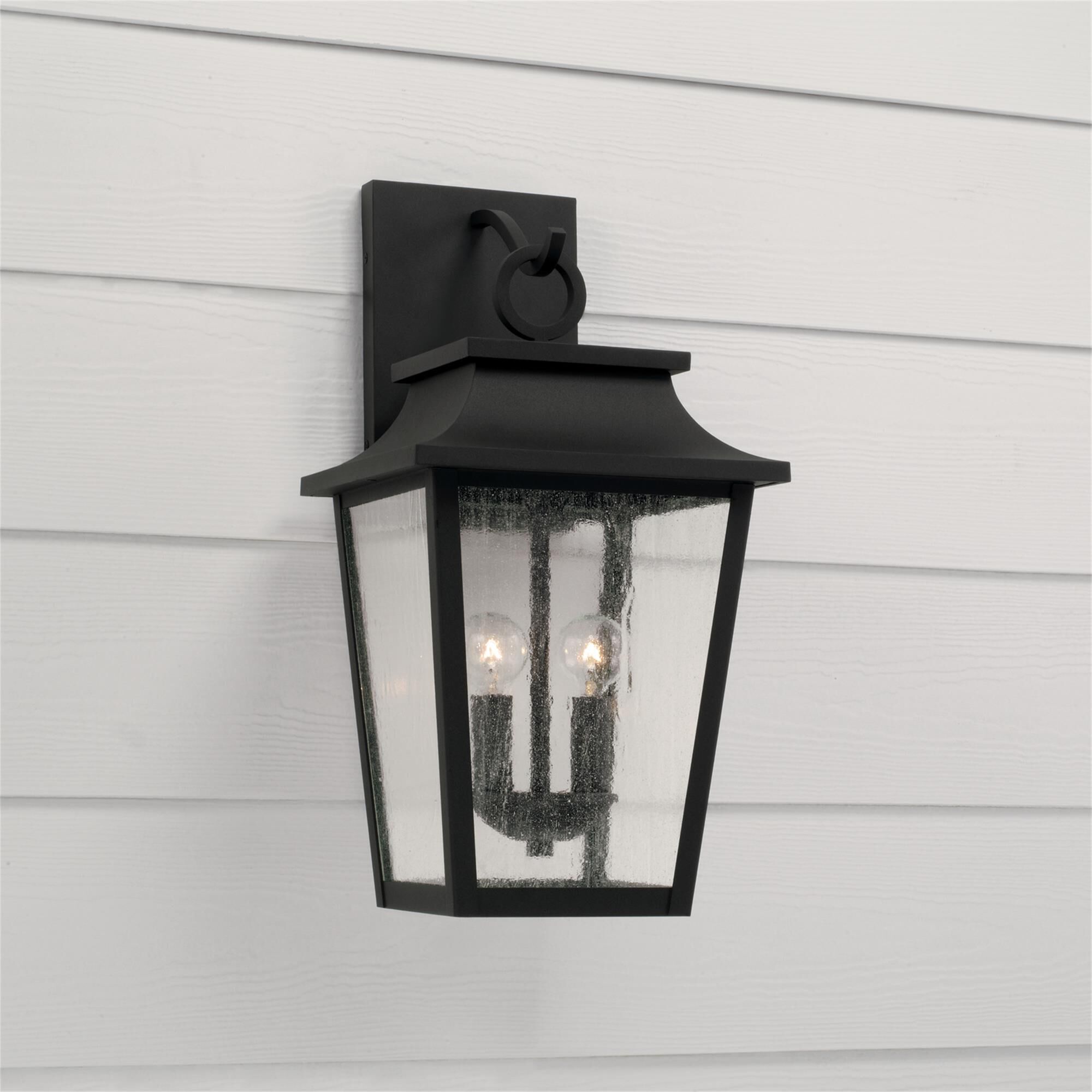 Shown in Black finish and Antiqued glass