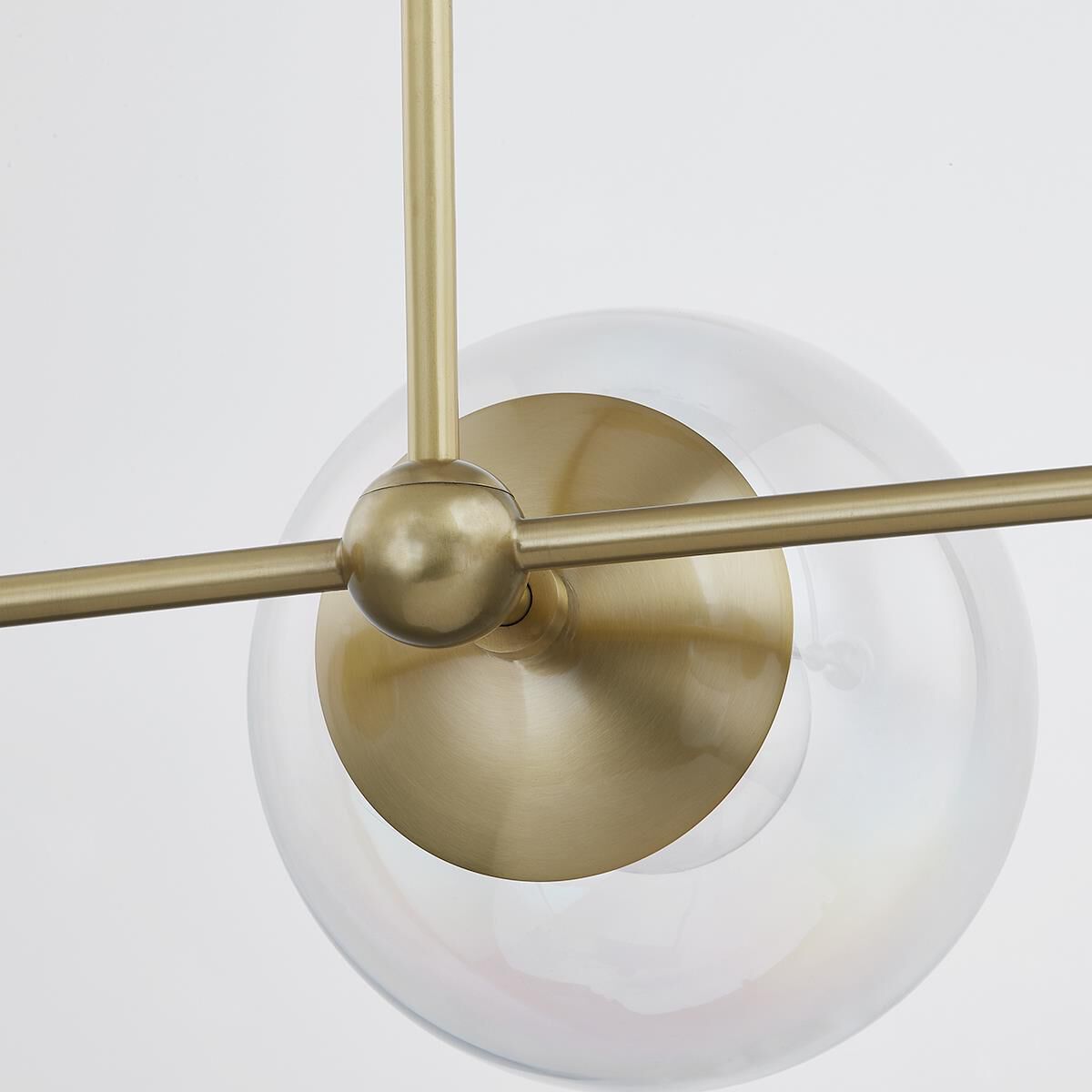 Shown in Aged Brass finish and Clear Plated Iridescent glass