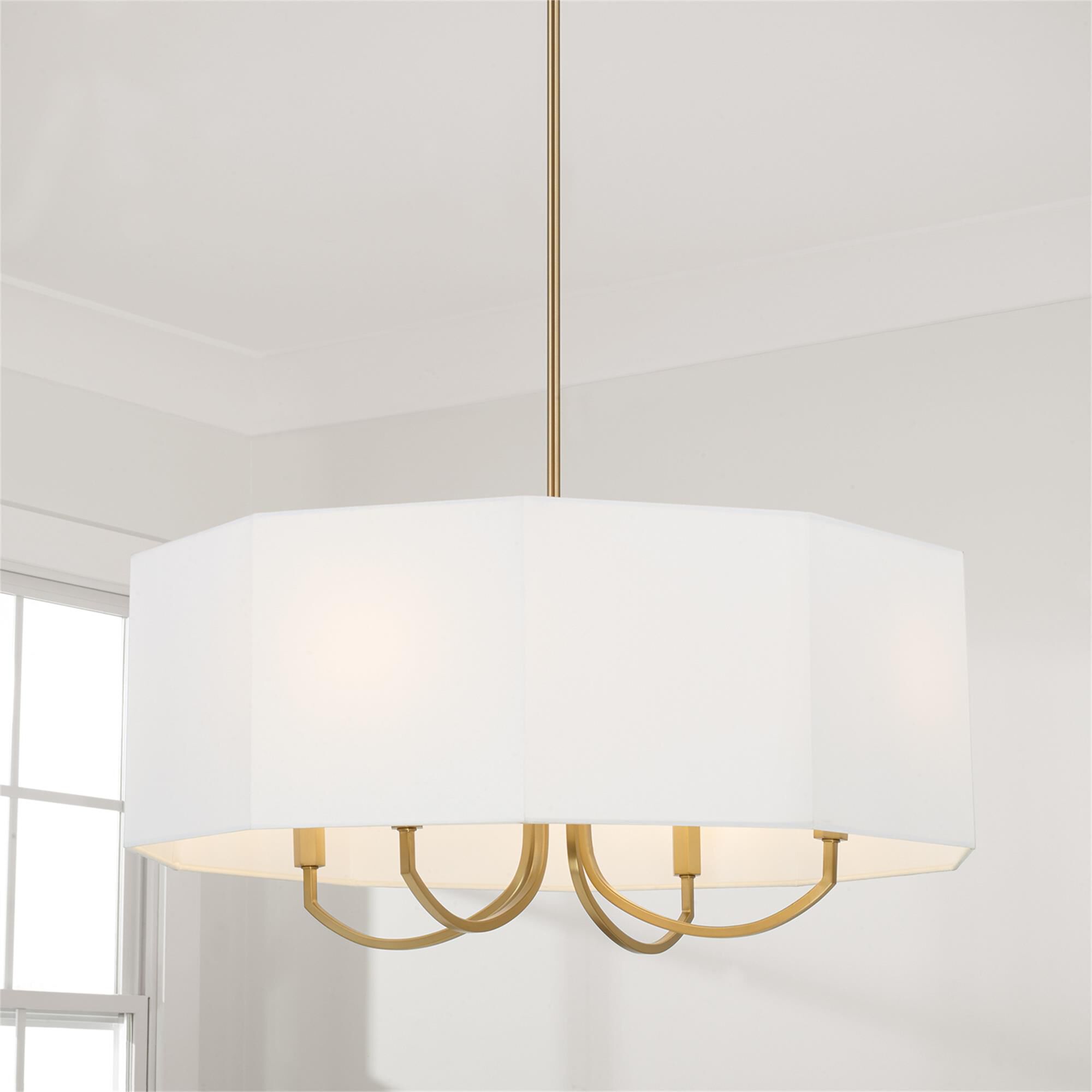 Shown in Aged Brass finish and White Fabric Octagonal shade